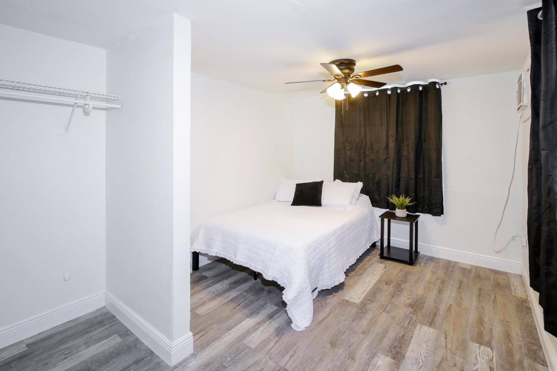 bedroom, detected: ceiling fan, bed, window blind