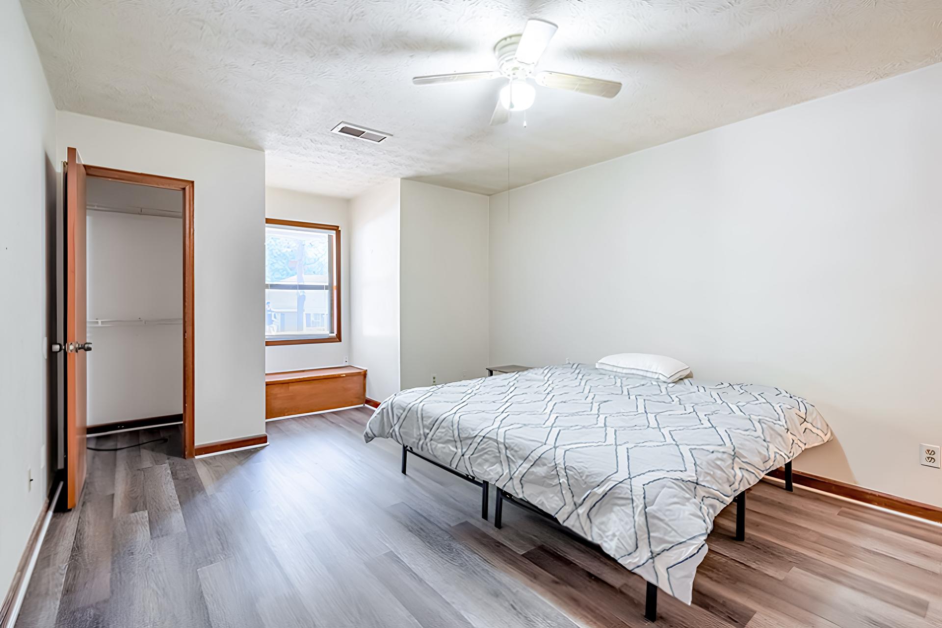 bedroom, detected: ceiling fan, bed, window blind