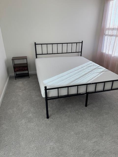 Bed, nightstand and Window