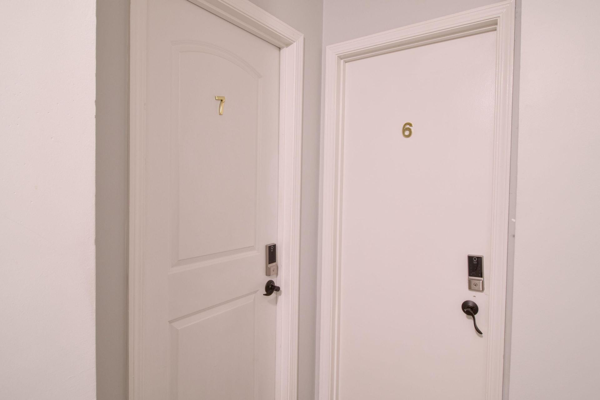 Door to Room 7 - Large room with both a walk-in and reach-in closet, ensuite bathroom and separate dressing area
