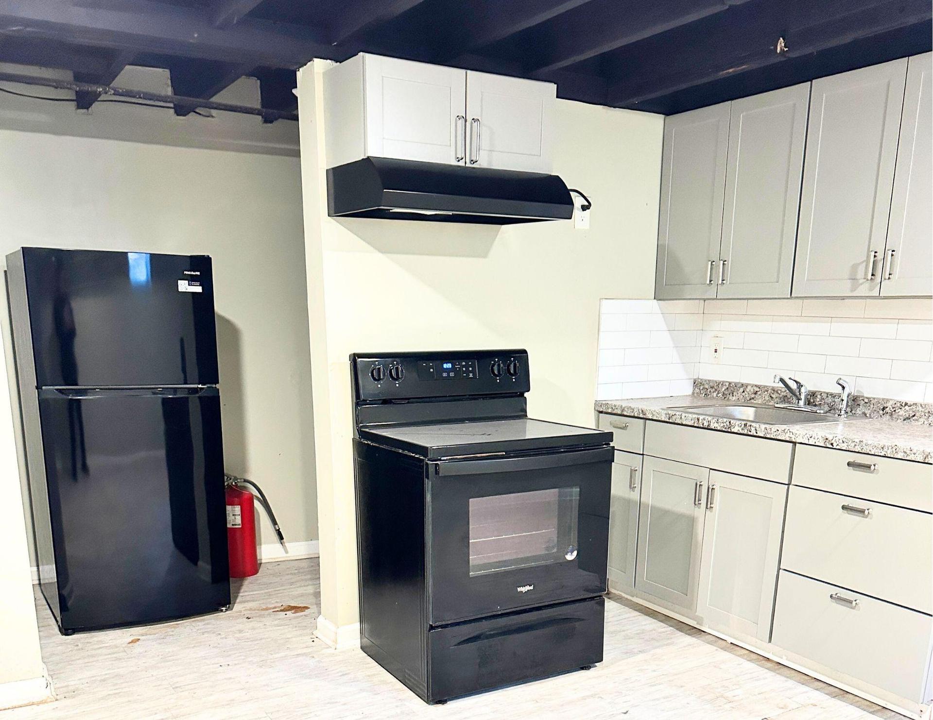 Private Kitchenette with Full Sized Oven and Refrigerator