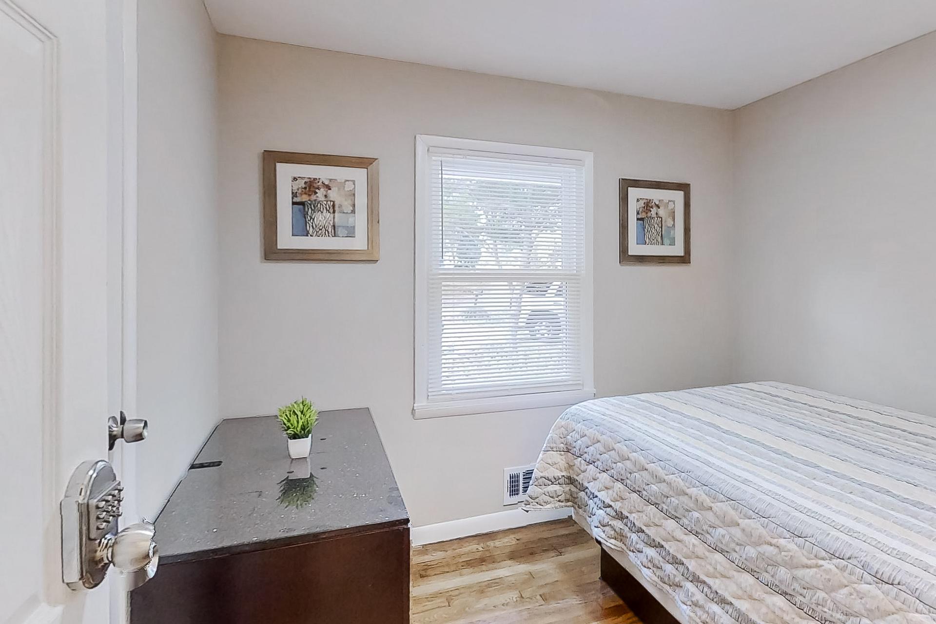 bedroom, detected: window blind, bed