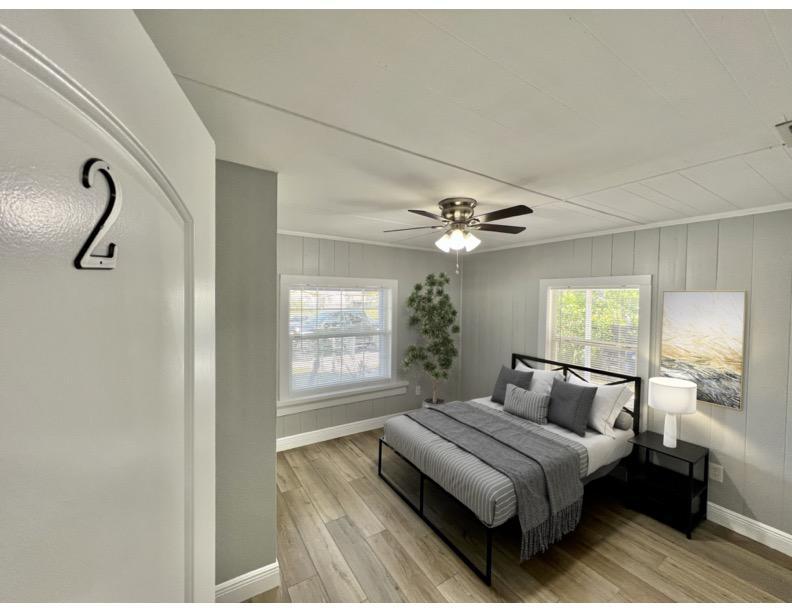 Full size bed with night stand and storage under bed