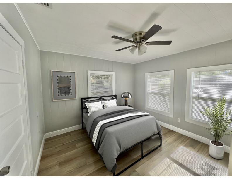 Full size bed with night stand and storage under bed