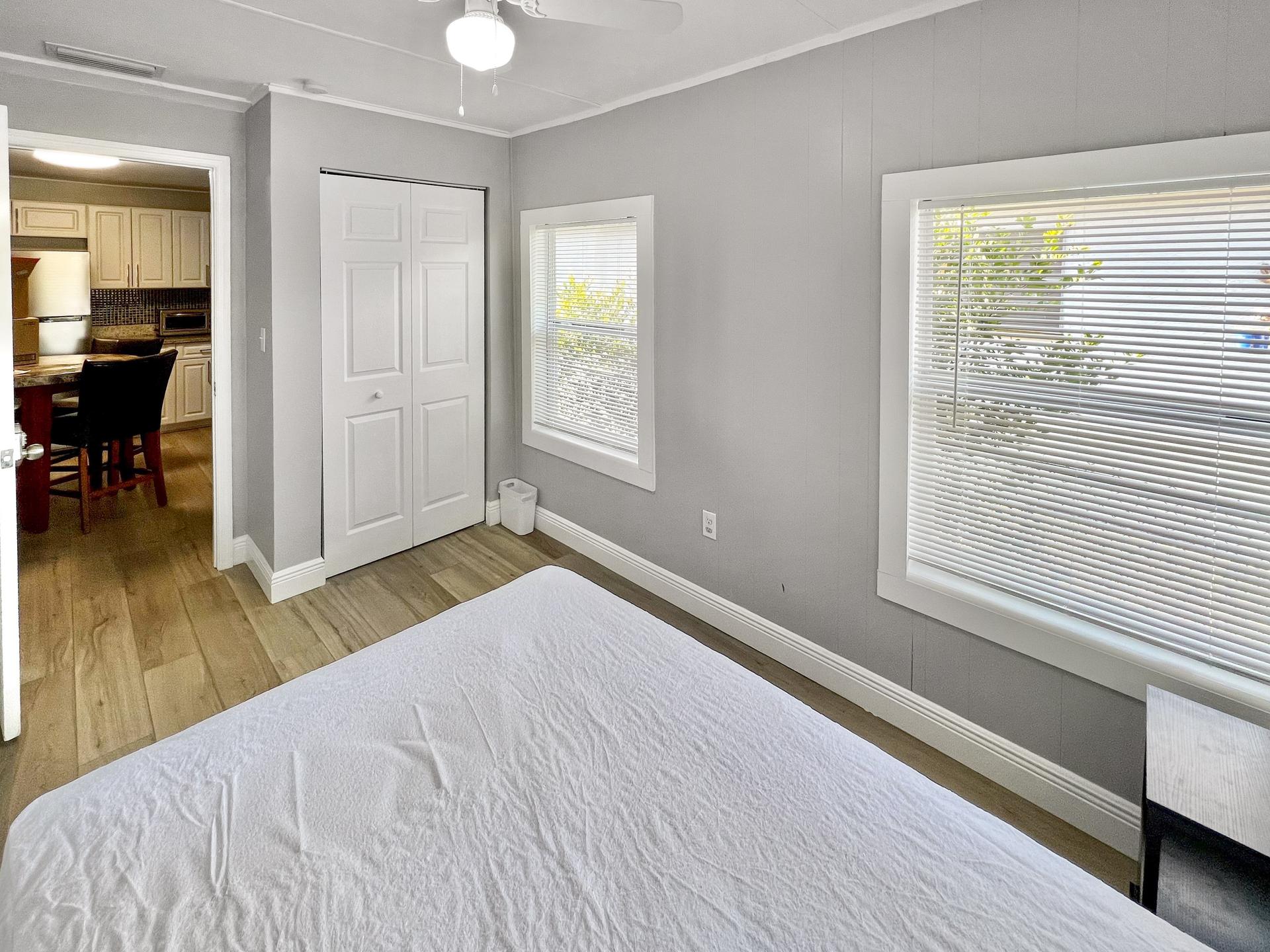 bedroom, detected: ceiling fan, window blind, bed