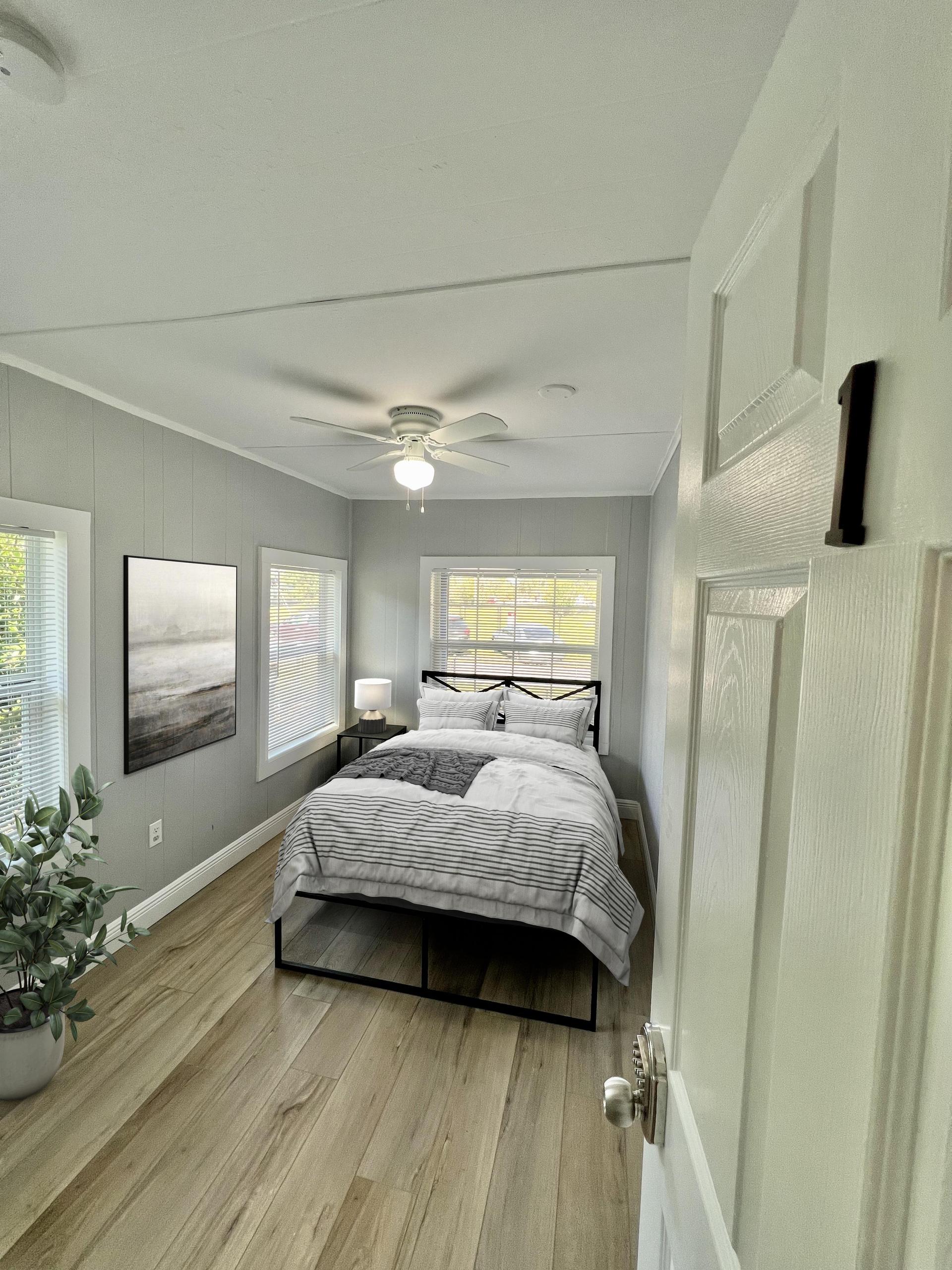 Full size bed with night stand and storage under bed