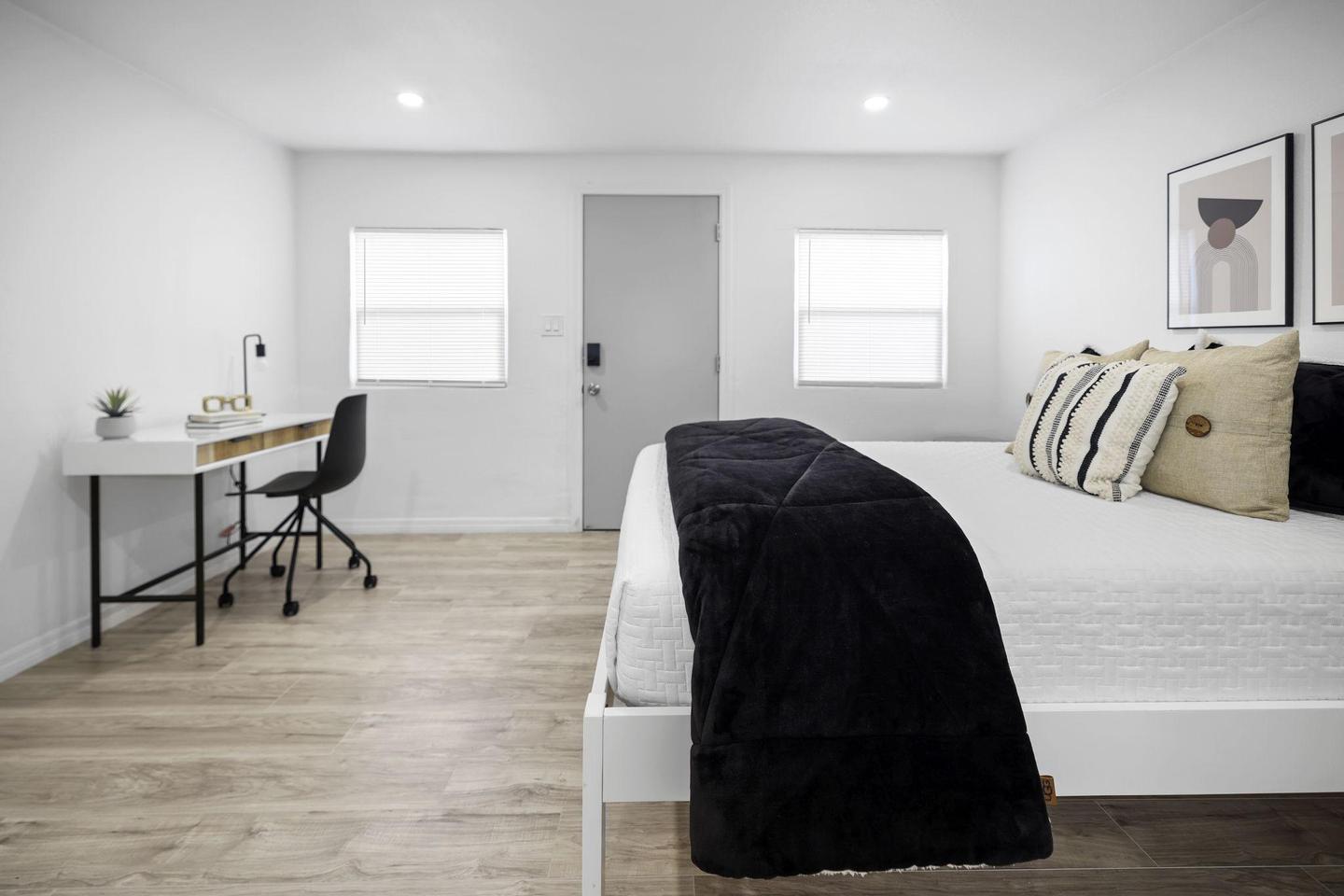 Bedroom 2 Angle 1 (Desk, Private Entrance & Bed View)