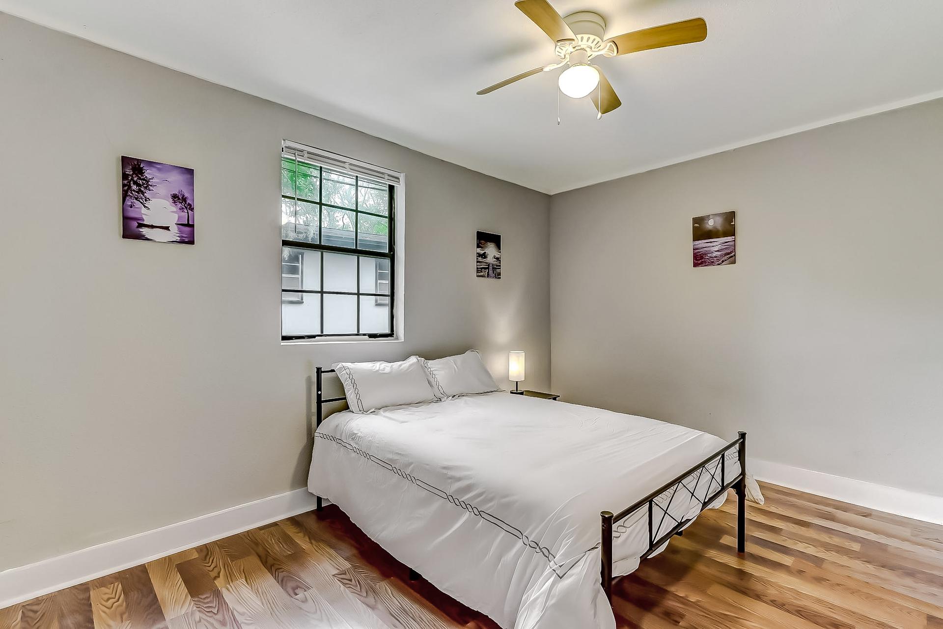bedroom, detected: ceiling fan, window blind, bed