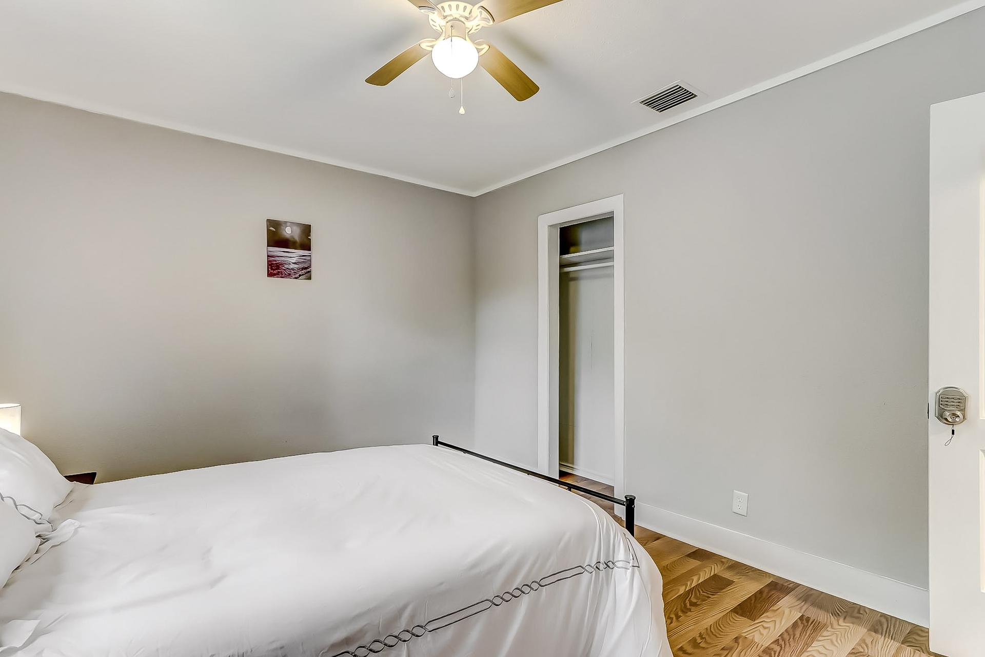 bedroom, detected: ceiling fan, bed, window blind