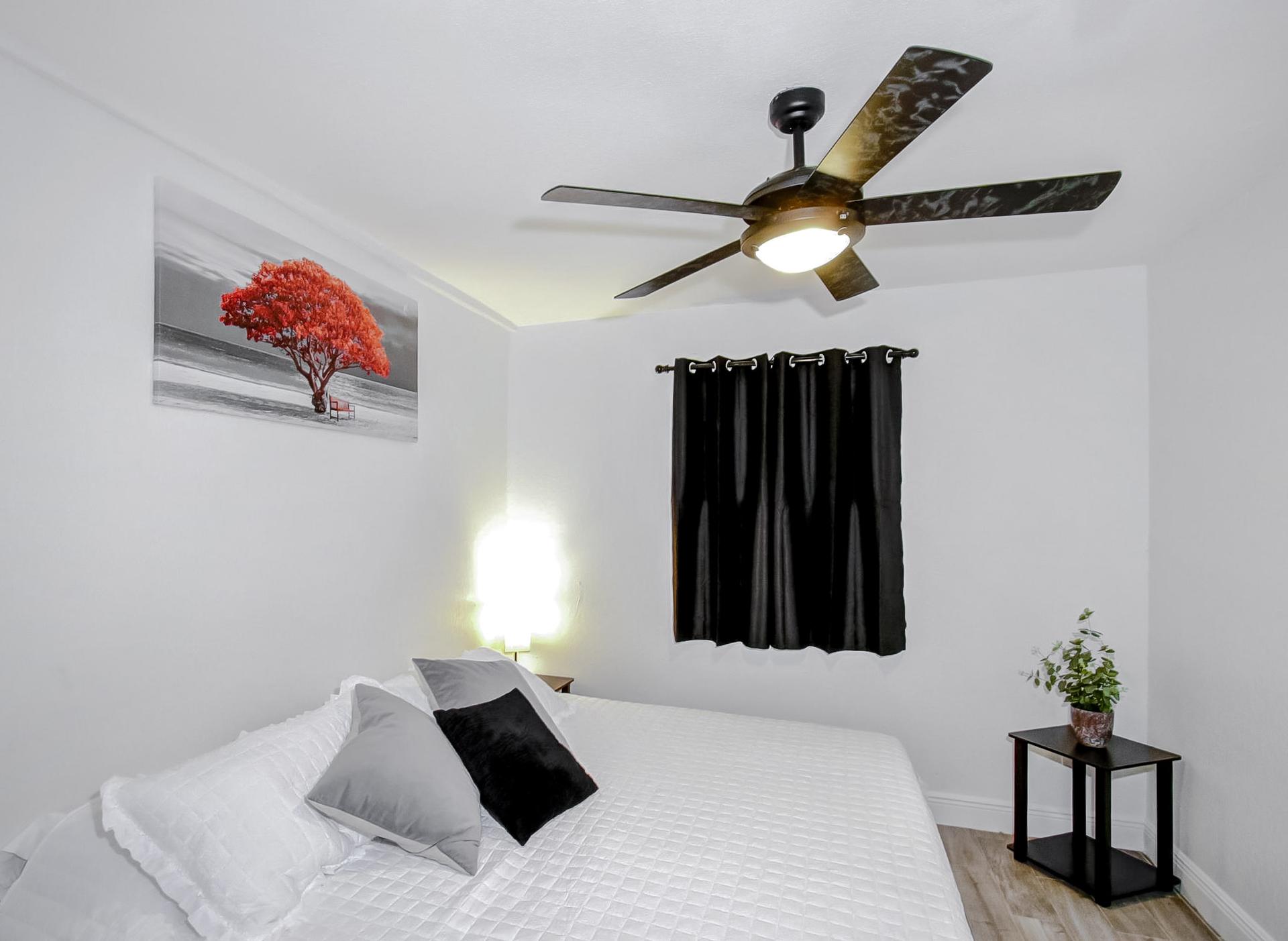 bedroom, detected: ceiling fan, bed, window blind