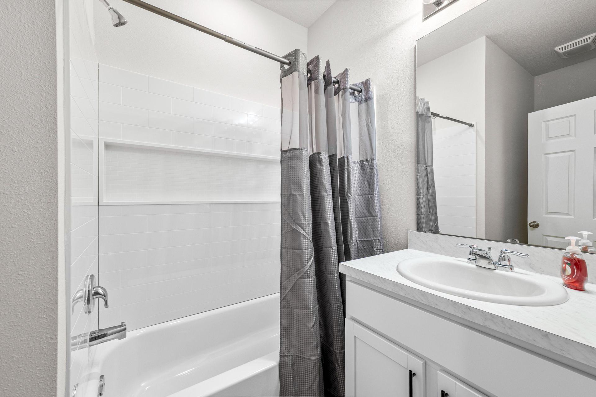 Full private washroom located in hallway with private lock and code.