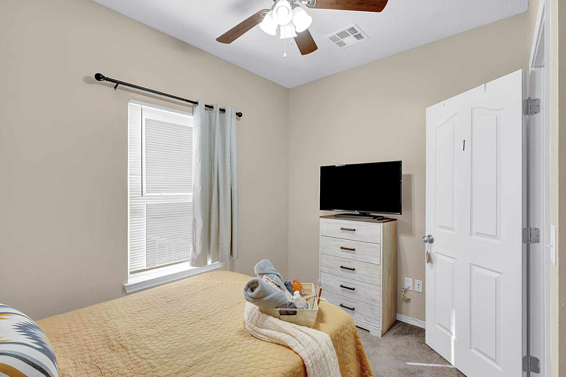 bedroom, detected: ceiling fan, window blind, bed