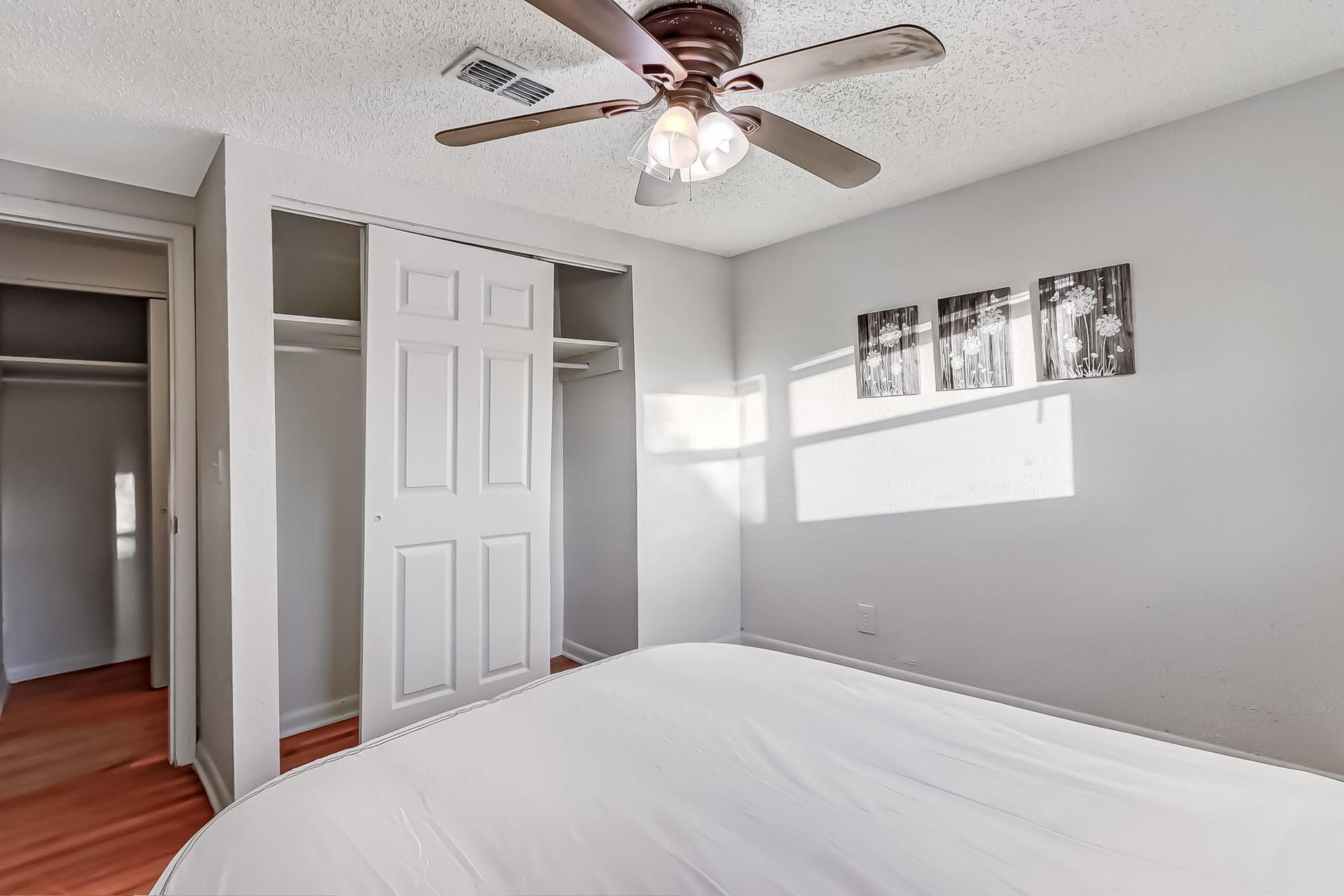 bedroom, detected: ceiling fan, bed, window blind