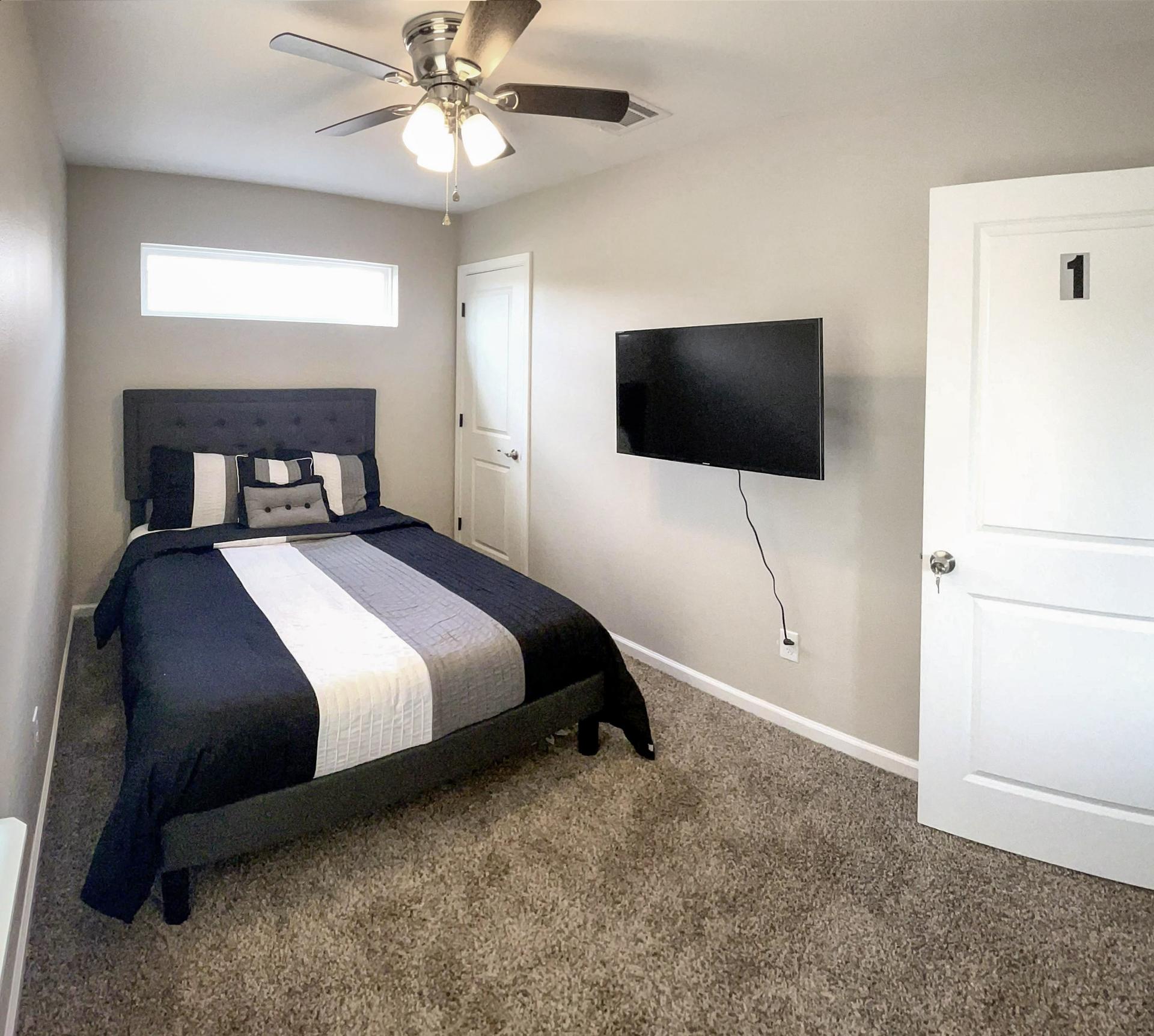 bedroom, detected: ceiling fan, bed, window blind