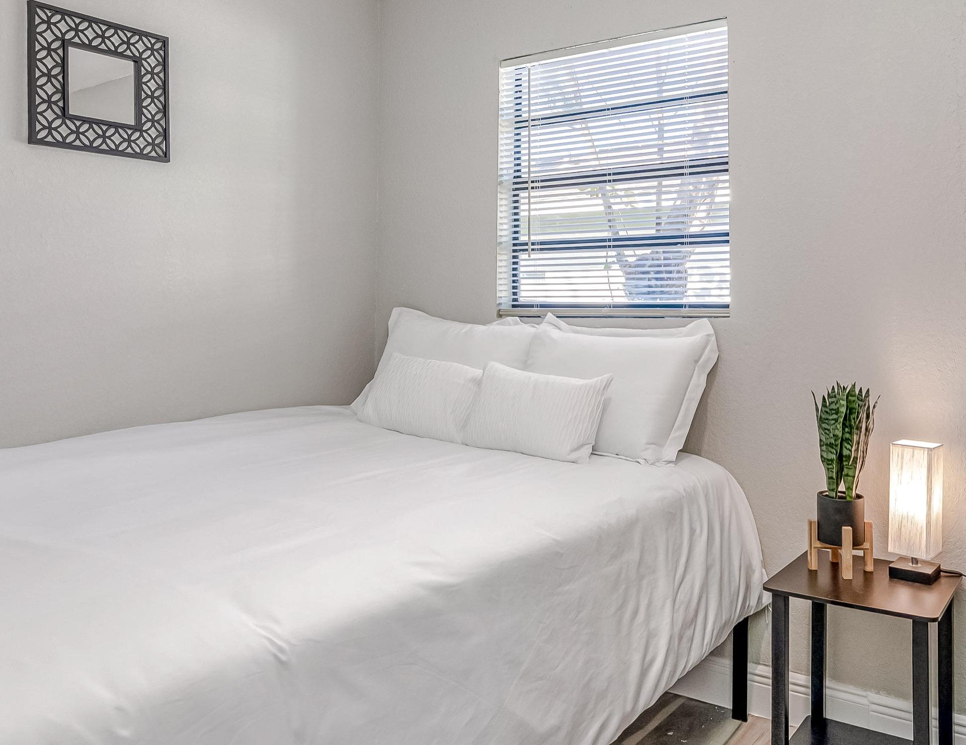 bedroom, detected: window blind, bed