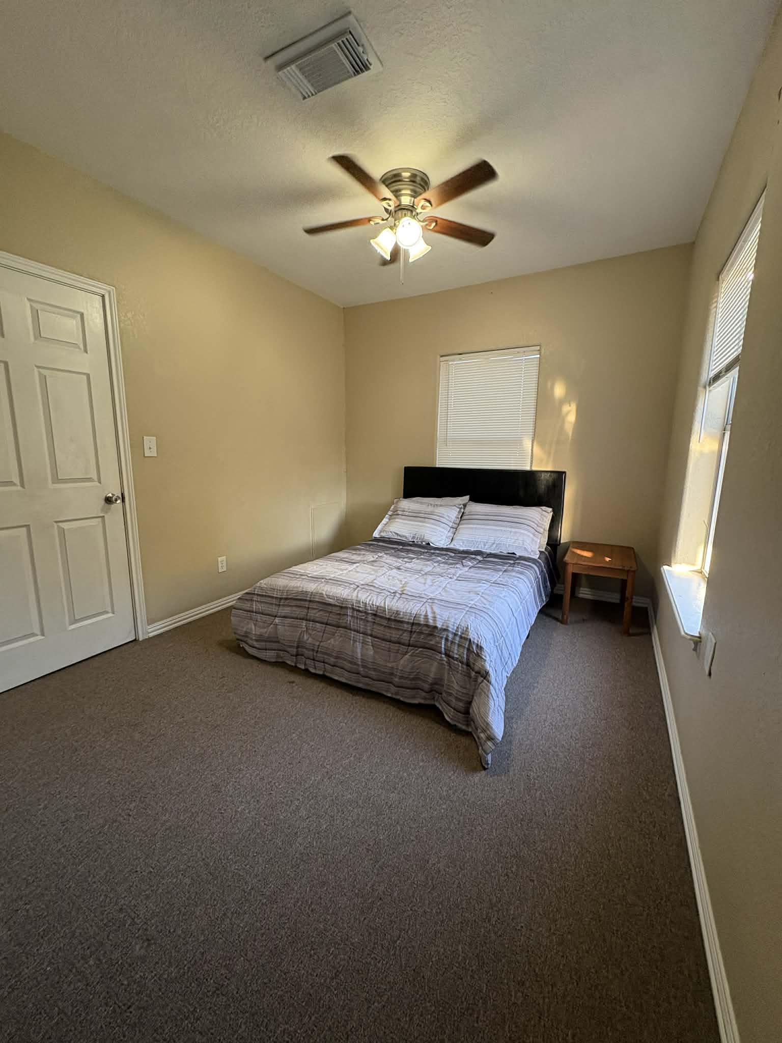 Located near the bathroom.