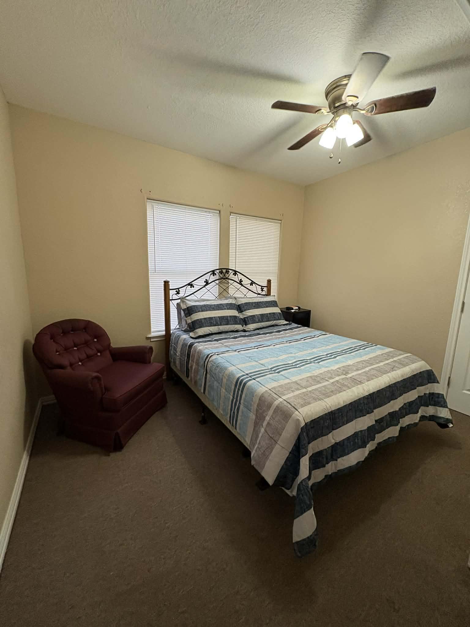 Queen bed with swivel rocker