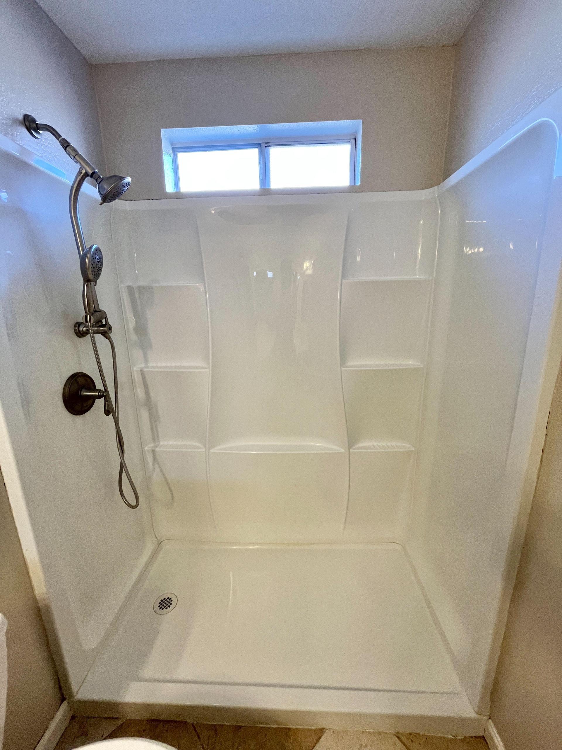 BEDROOM 1 - PRIVATE SHOWER