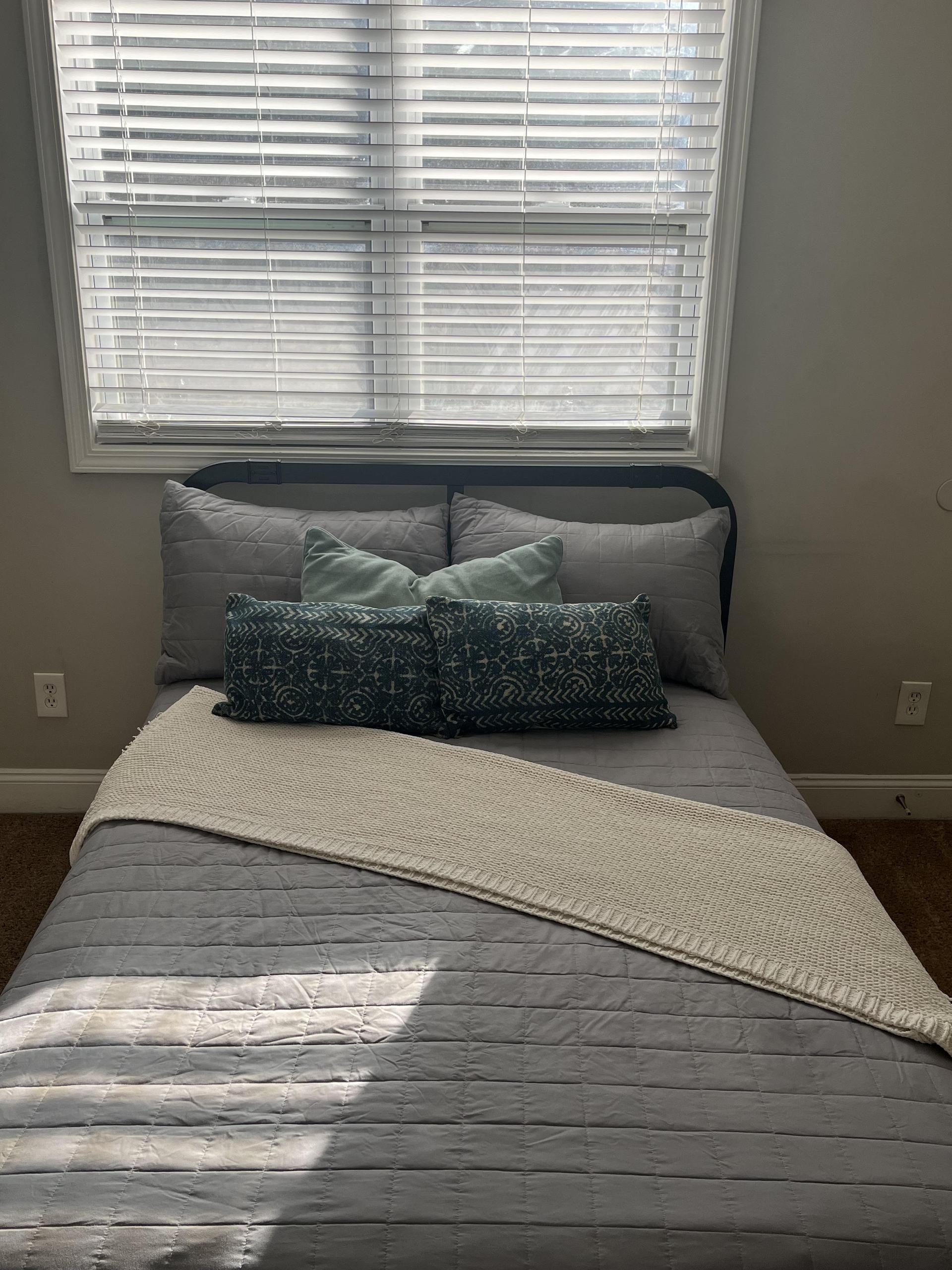 Full bed with built-in desk and flat screen smart tv. Street parking only. **Bedding not included.**