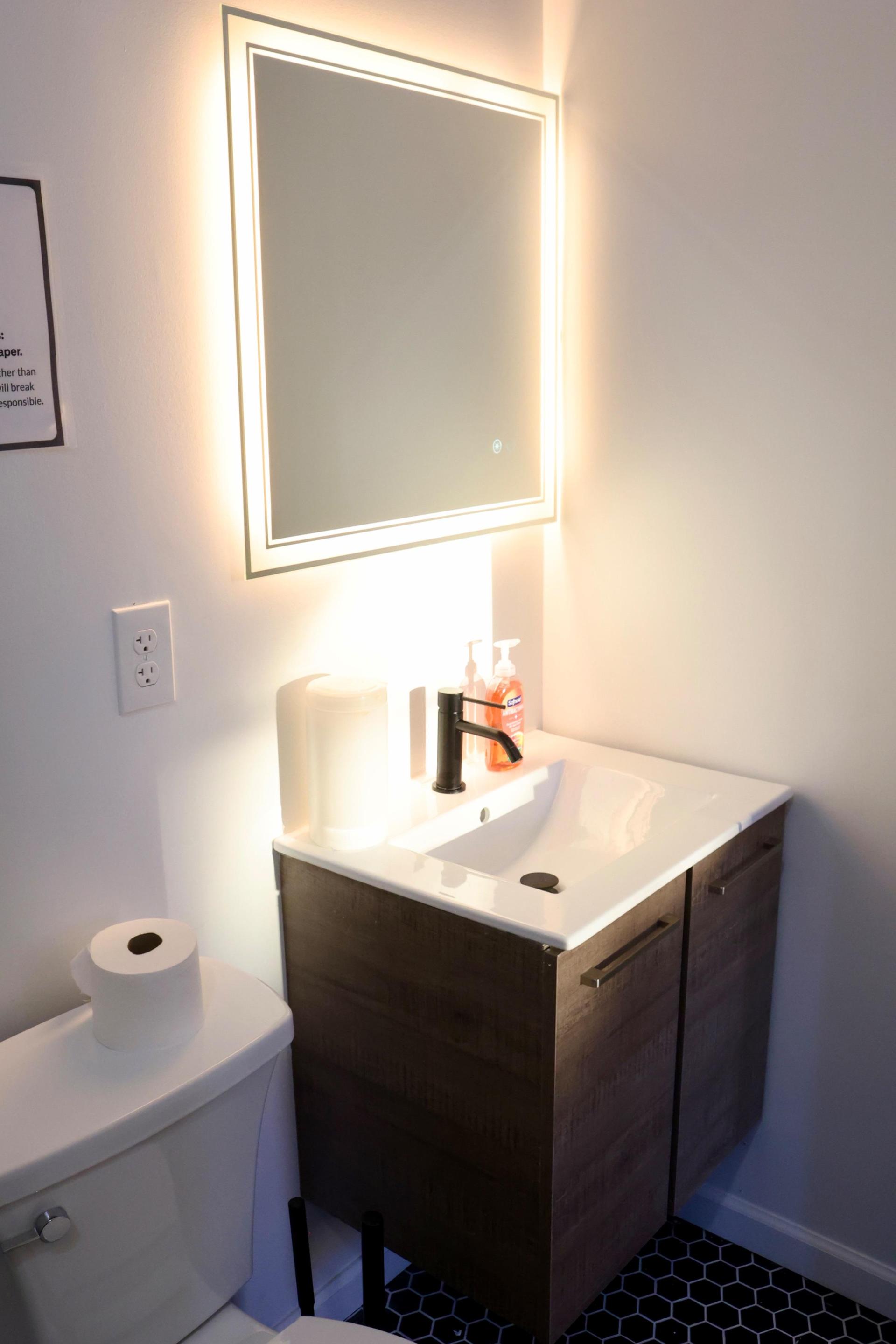 LED vanity mirror with essentials included