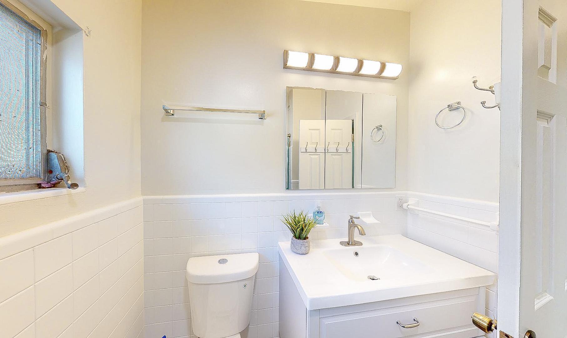 Single sink with drawers below.