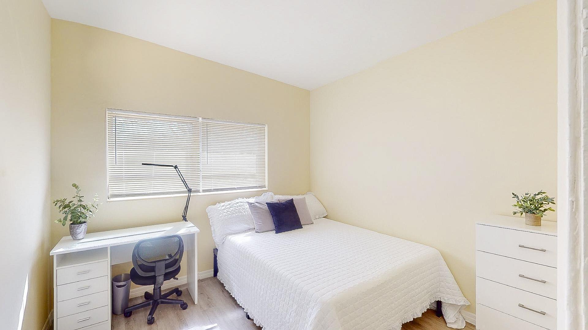 The closet is what the bed faces. The window looks on the back yard.