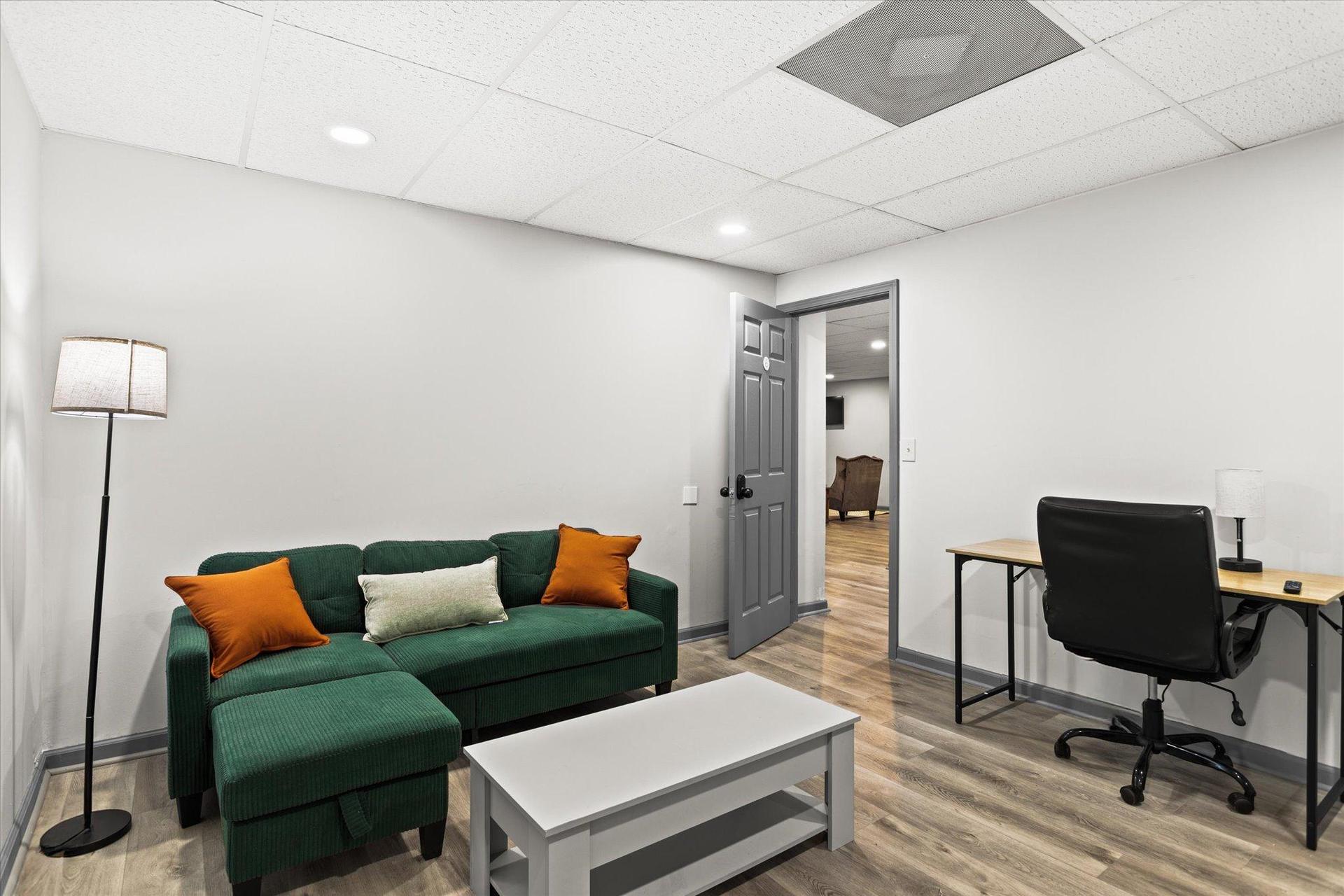 Room #6 features a sectional seating area for your comfort and added lounging space.