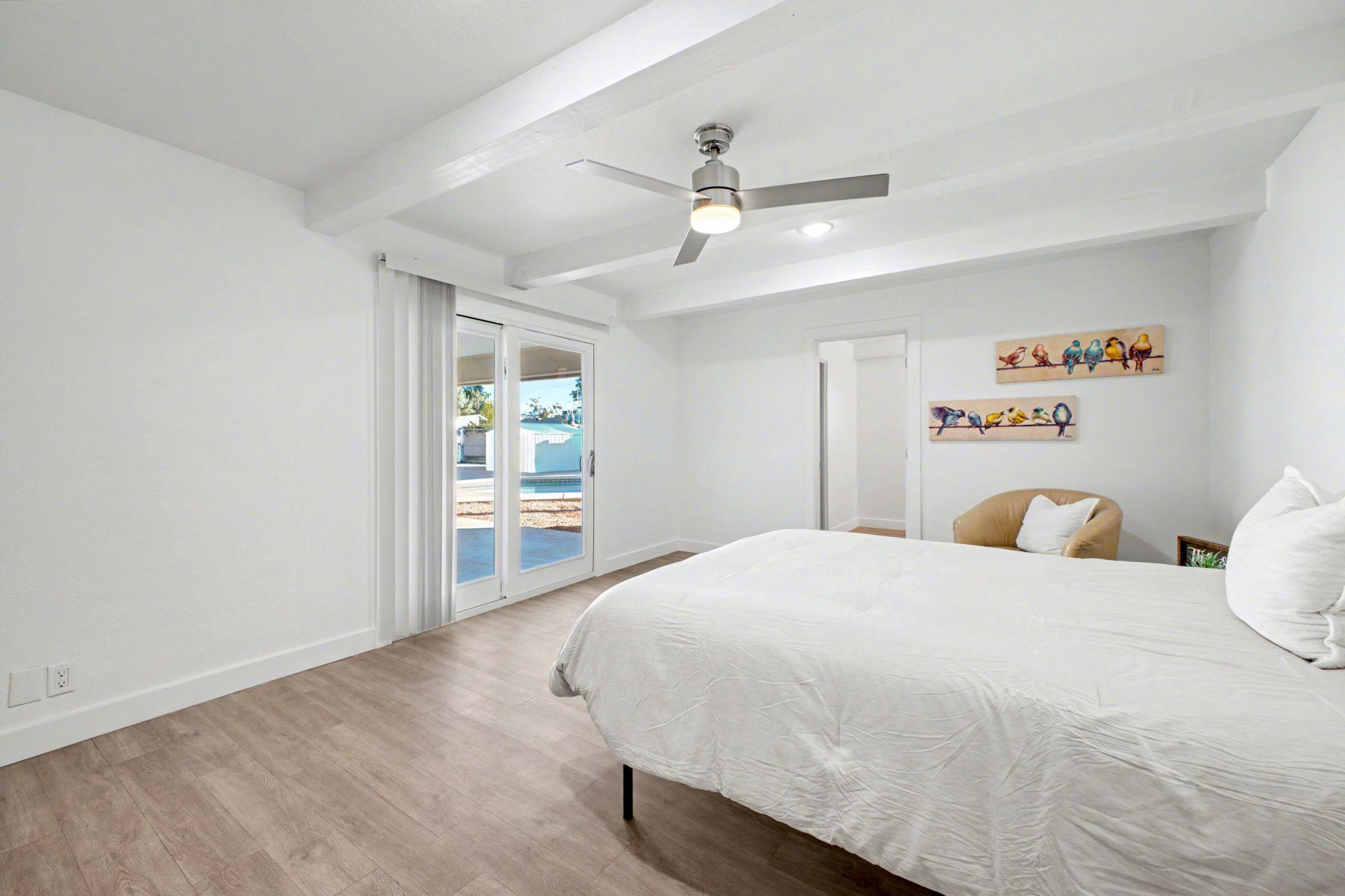 Primary Bedroom with nice view of the back yard.