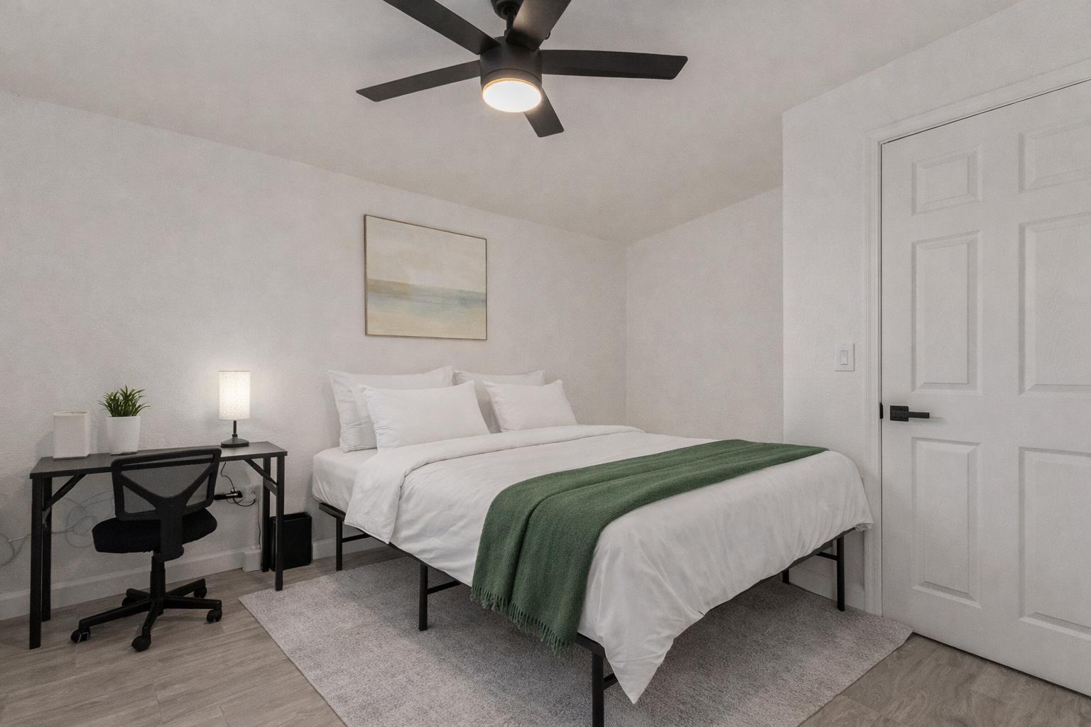 Queen Size bed and room faces the back of the house.