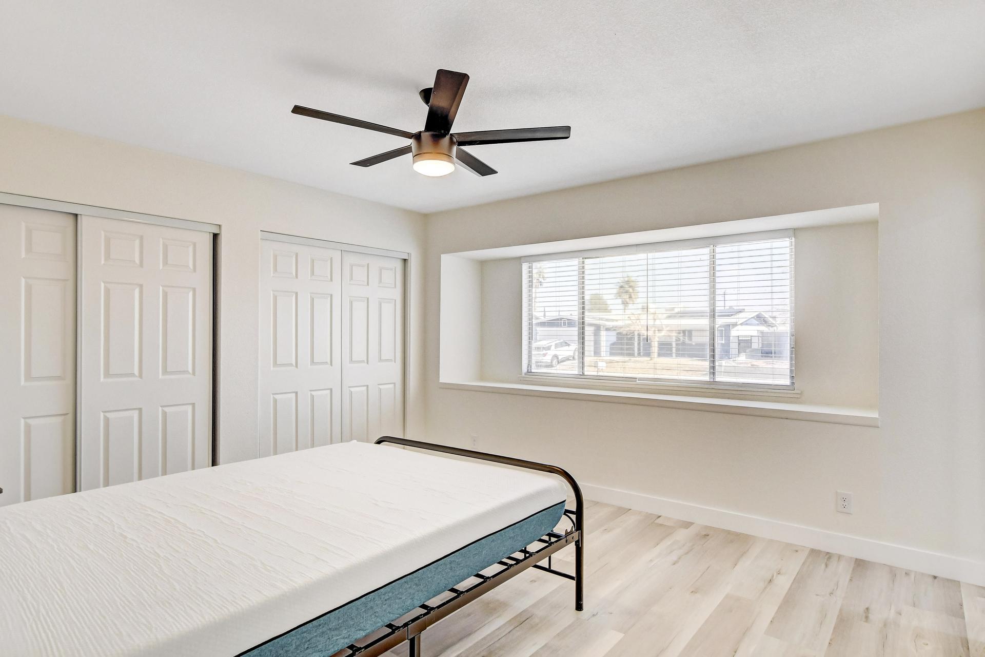 bedroom, detected:ceiling fan, bed, window blind