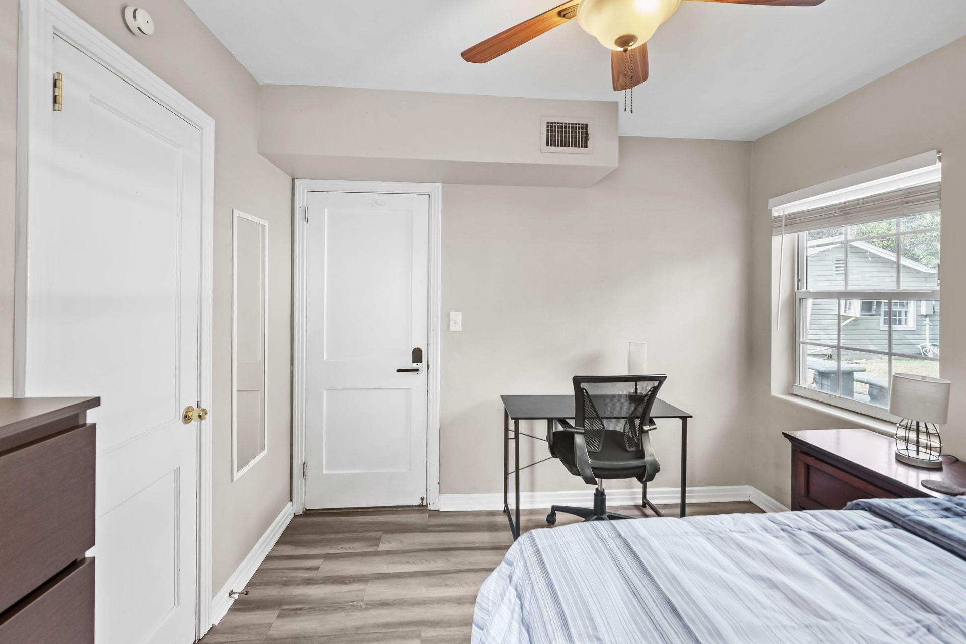 Full bed with large closet, desk & TV