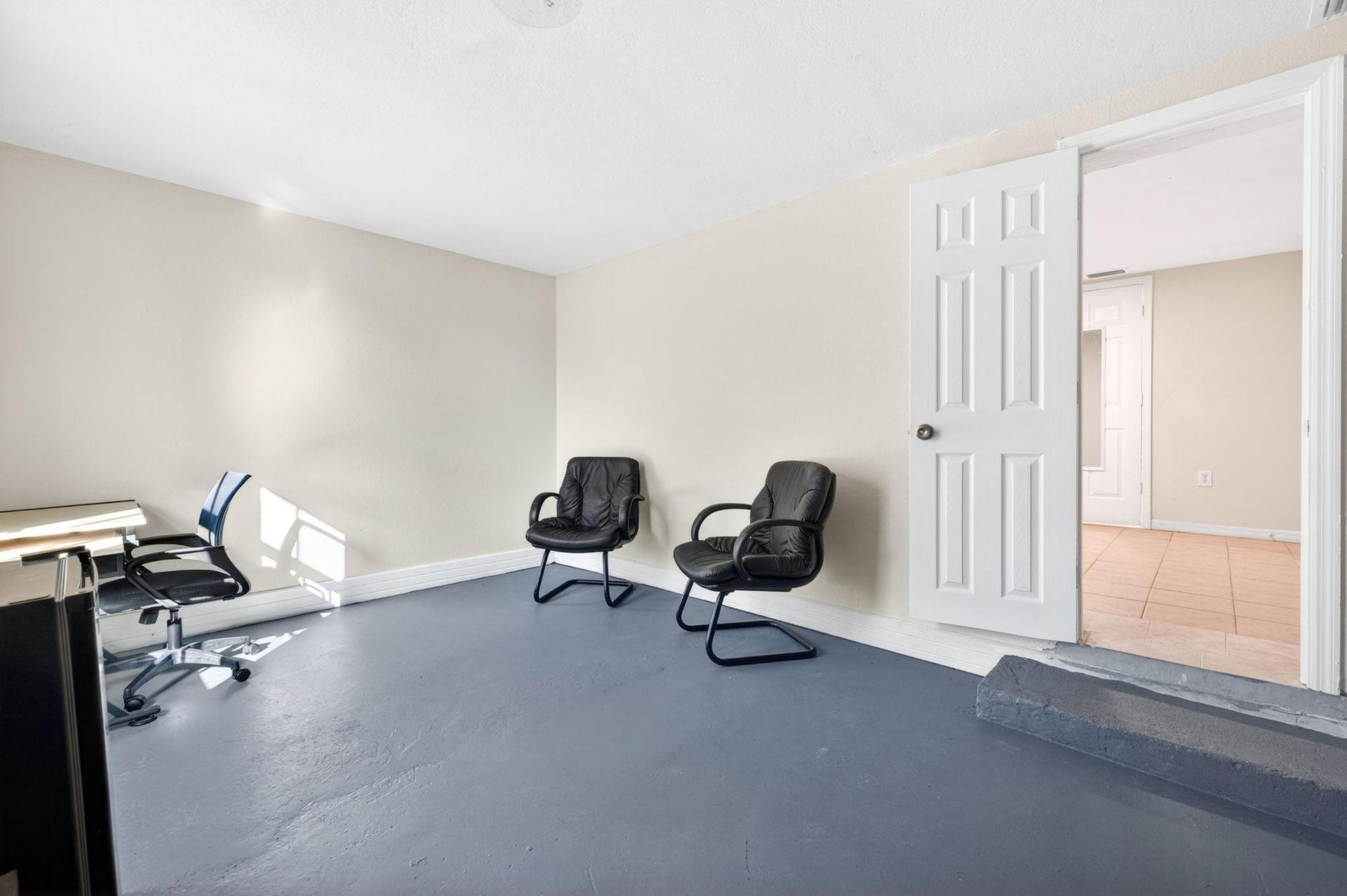 Living Area complete with Mini Fridge and Workspace