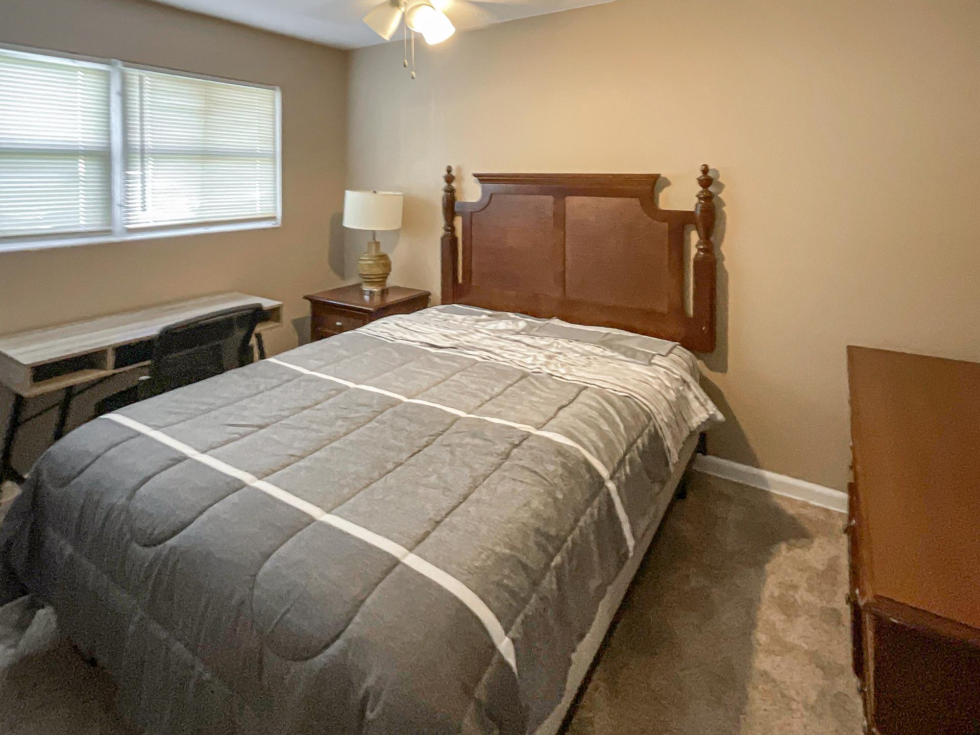 bedroom, detected:window blind, bed, ceiling fan