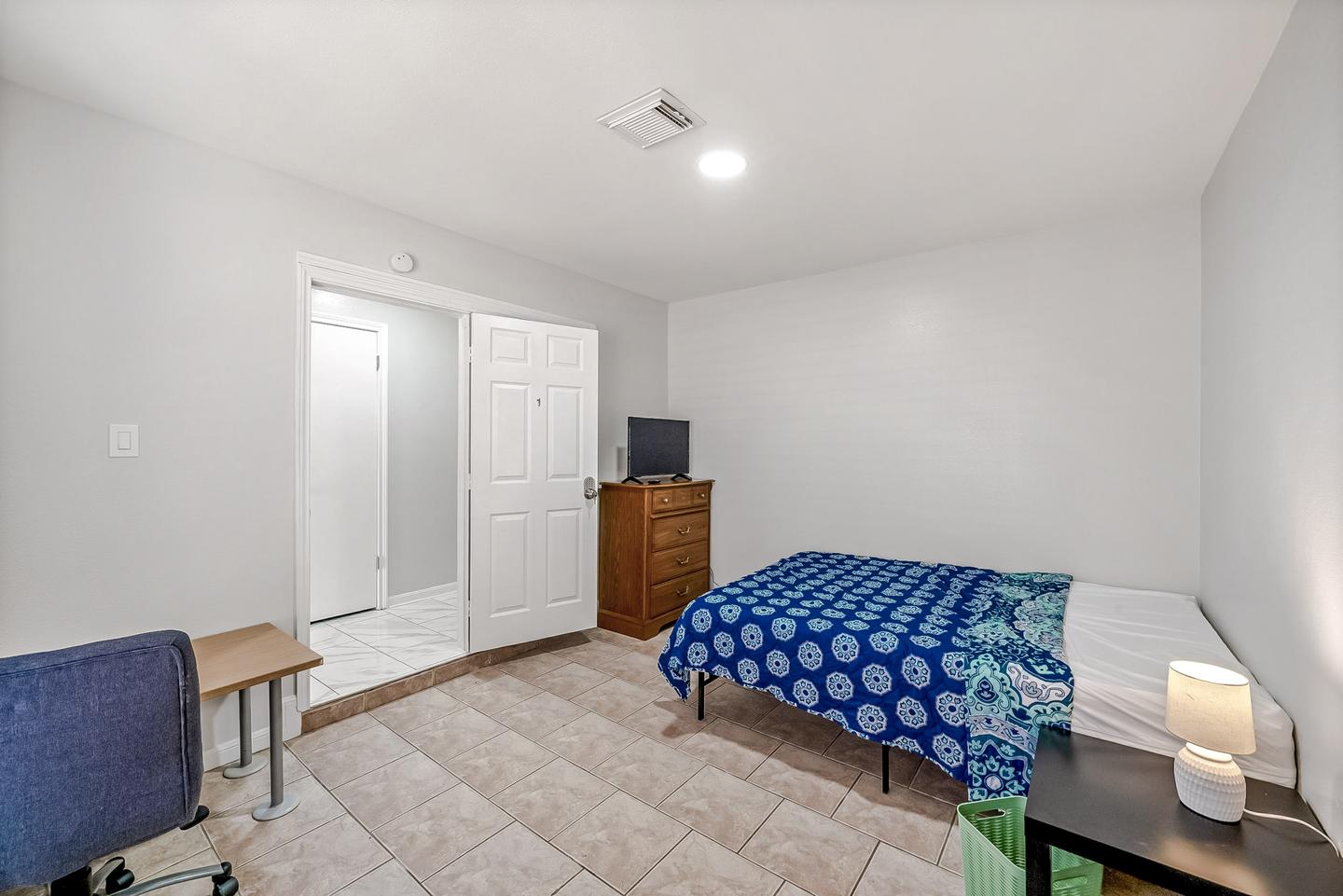 Premium Trim level room with all the basics plus a smart TV, Deck, Office Chair, and blackout shades.