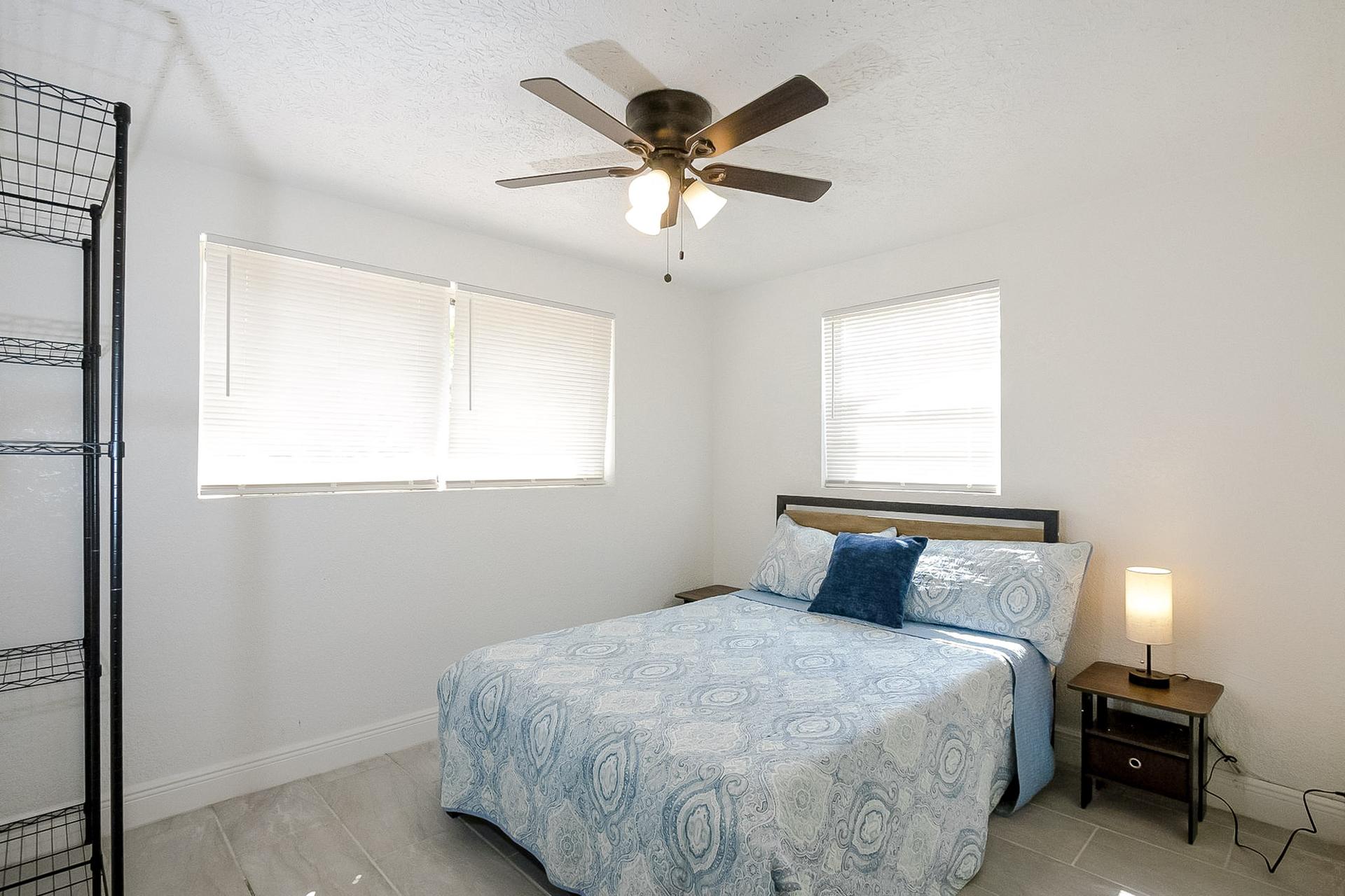 bedroom, detected:ceiling fan, window blind, bed