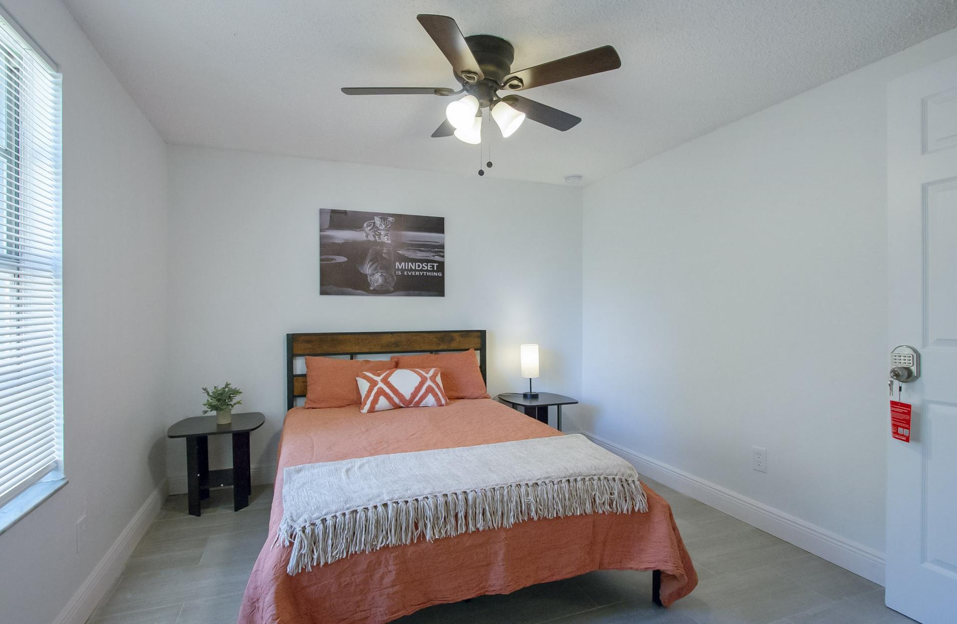 bedroom, detected:window blind, ceiling fan, bed