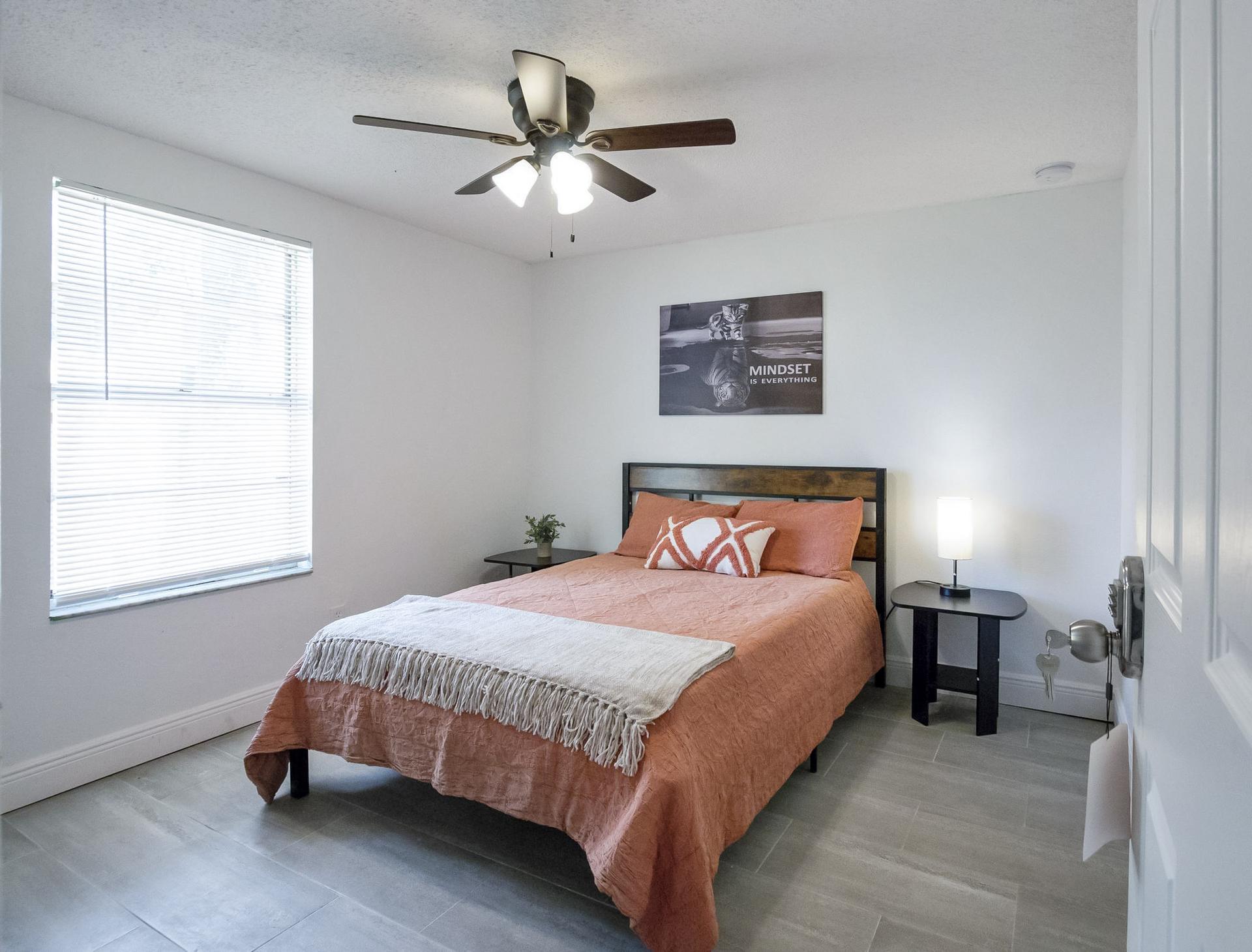 bedroom, detected:ceiling fan, window blind, bed