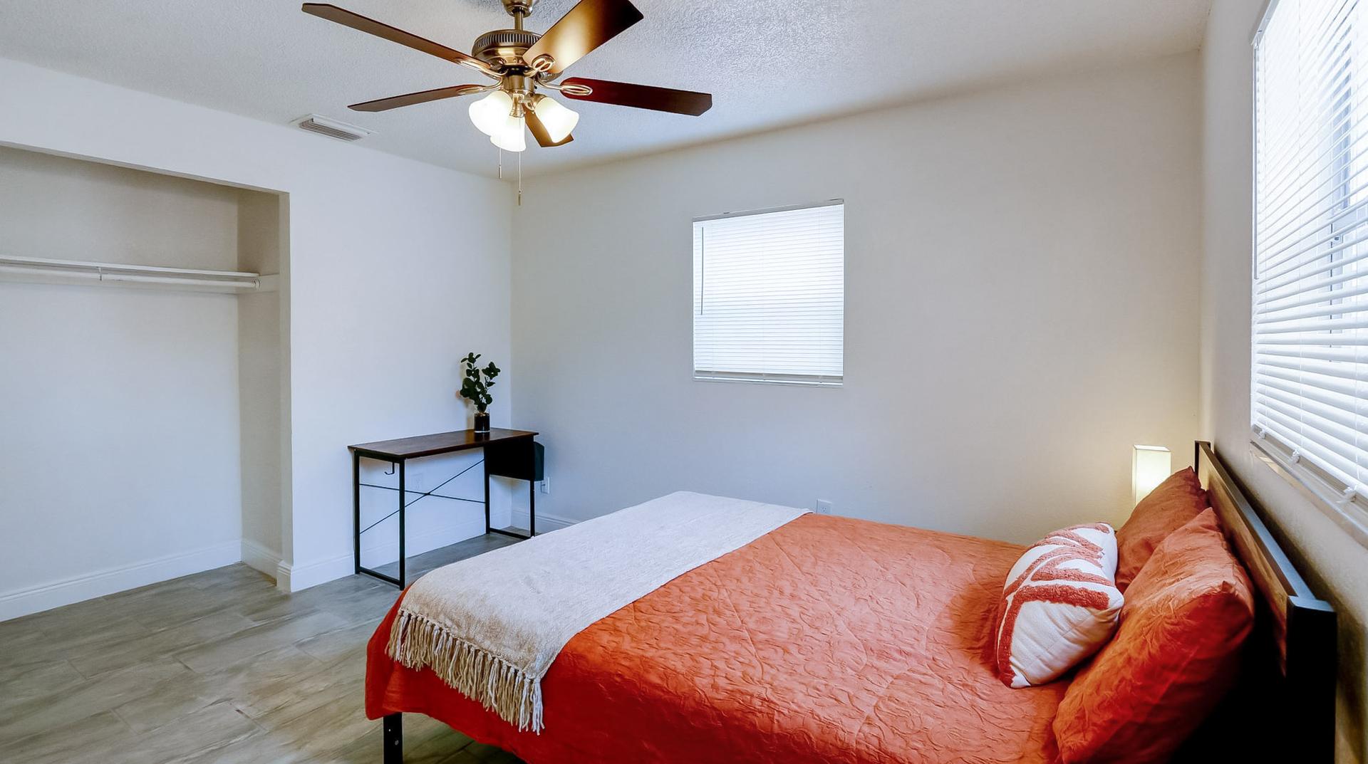 bedroom, detected:ceiling fan, window blind, bed