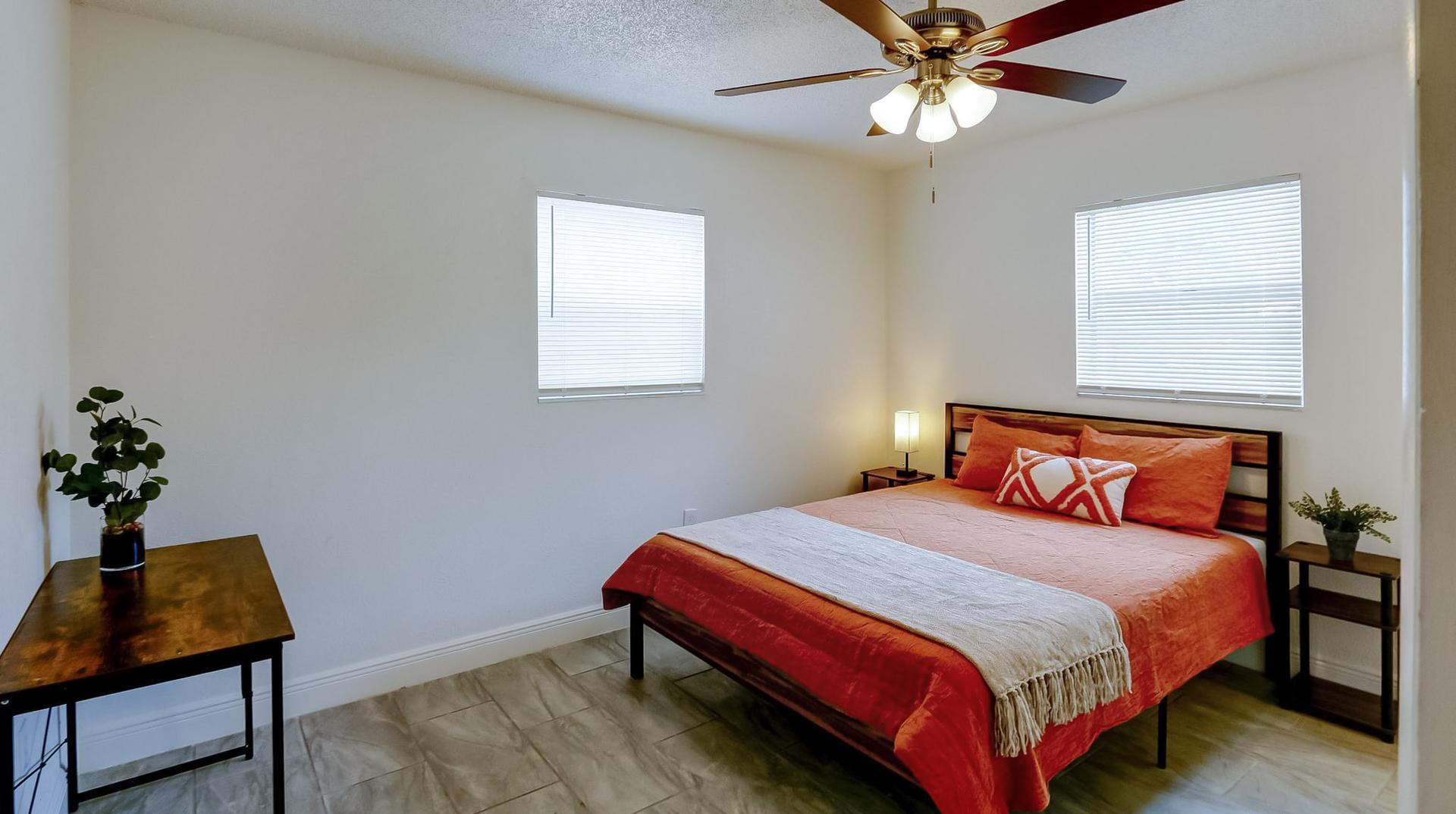 bedroom, detected:ceiling fan, window blind, bed