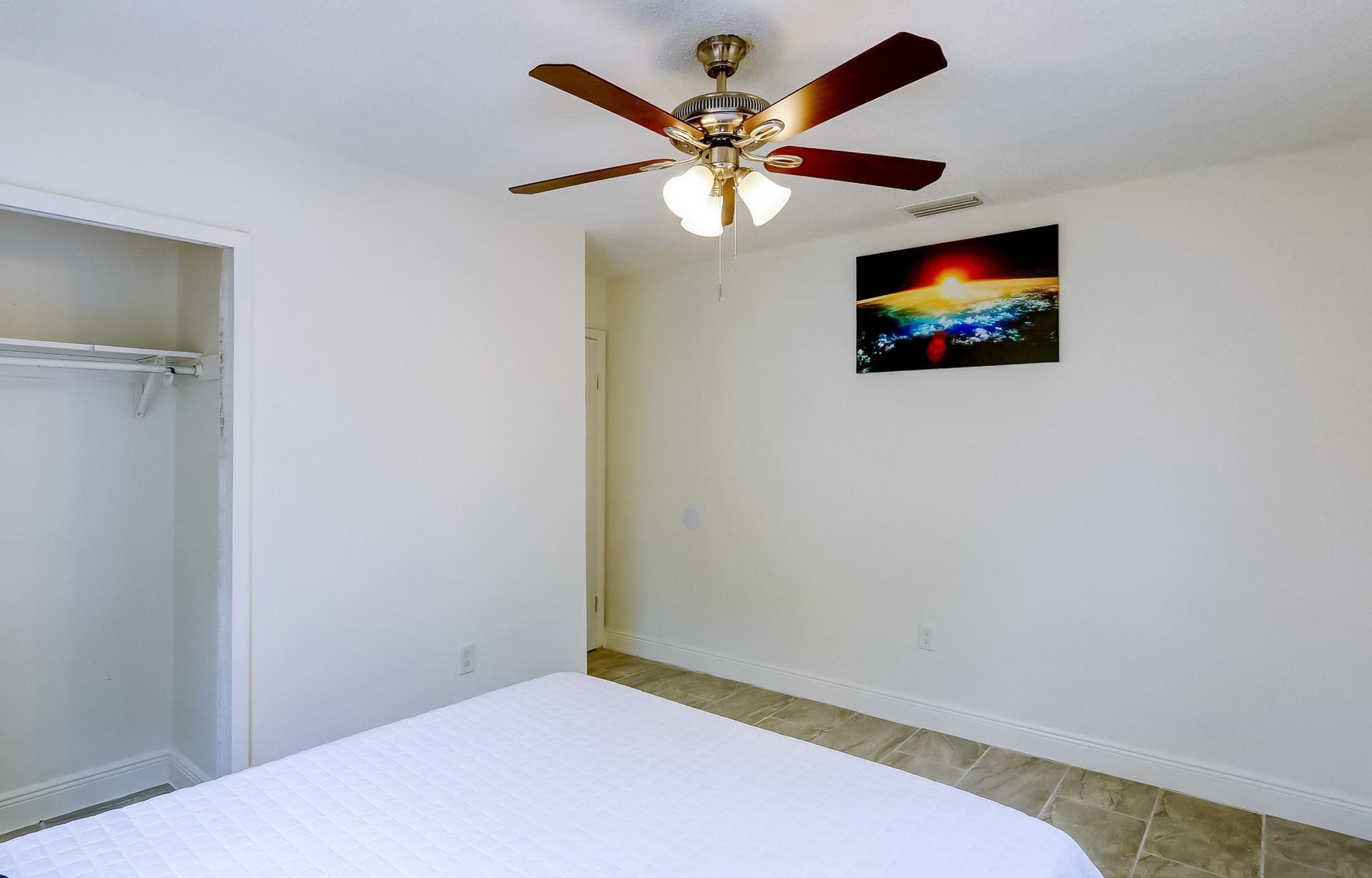 bedroom, detected:ceiling fan, bed, window blind