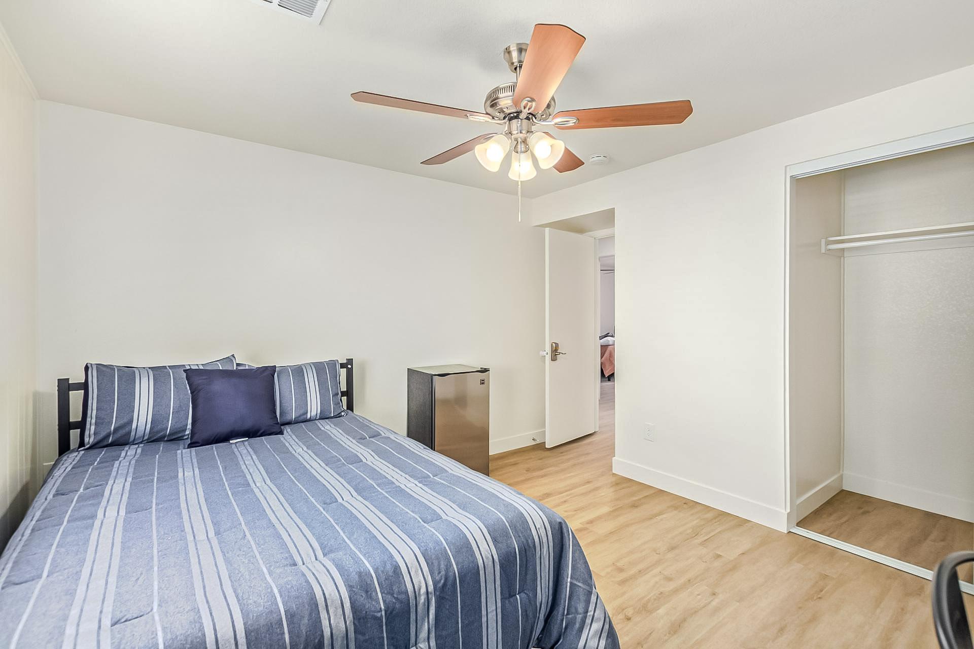 Full size bed with desk and chair and full size reach in closet.  Mini fridge too. Comes with monthly cleaning/shared areas.