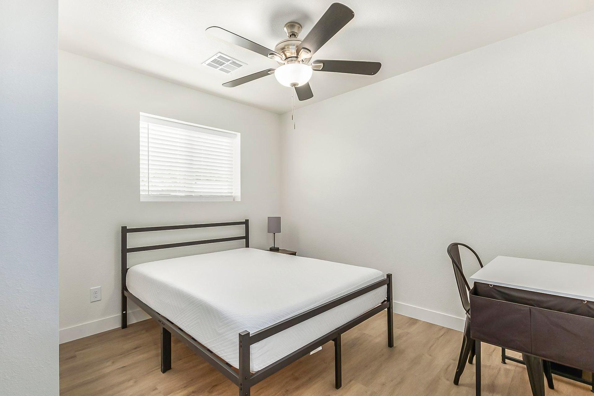 living_room, detected:ceiling fan, window blind