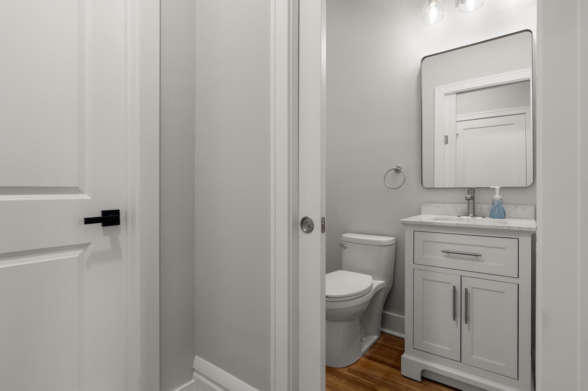 This half bathroom is shared with Room #2