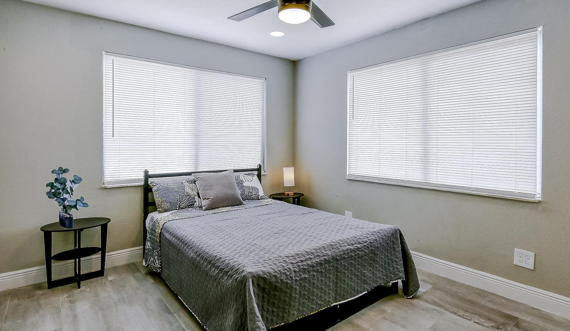 bedroom, detected:ceiling fan, window blind, bed