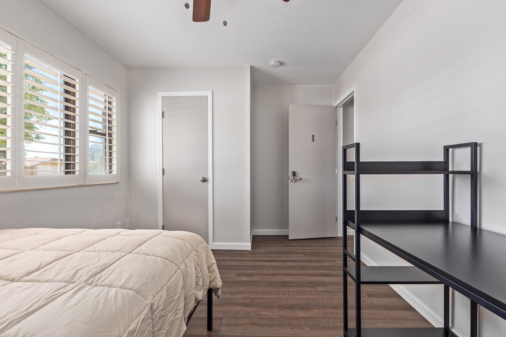 With desk and closet.