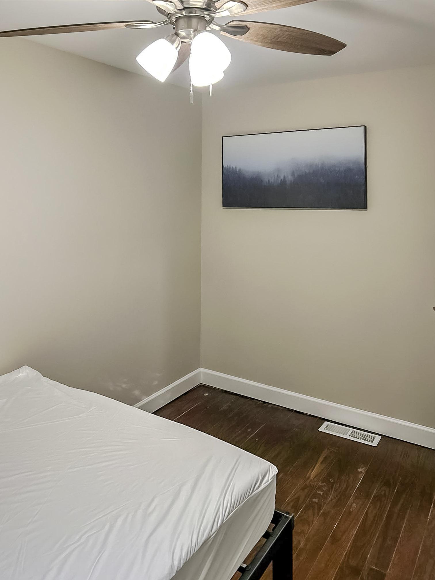 bedroom, detected:ceiling fan, window blind, bed