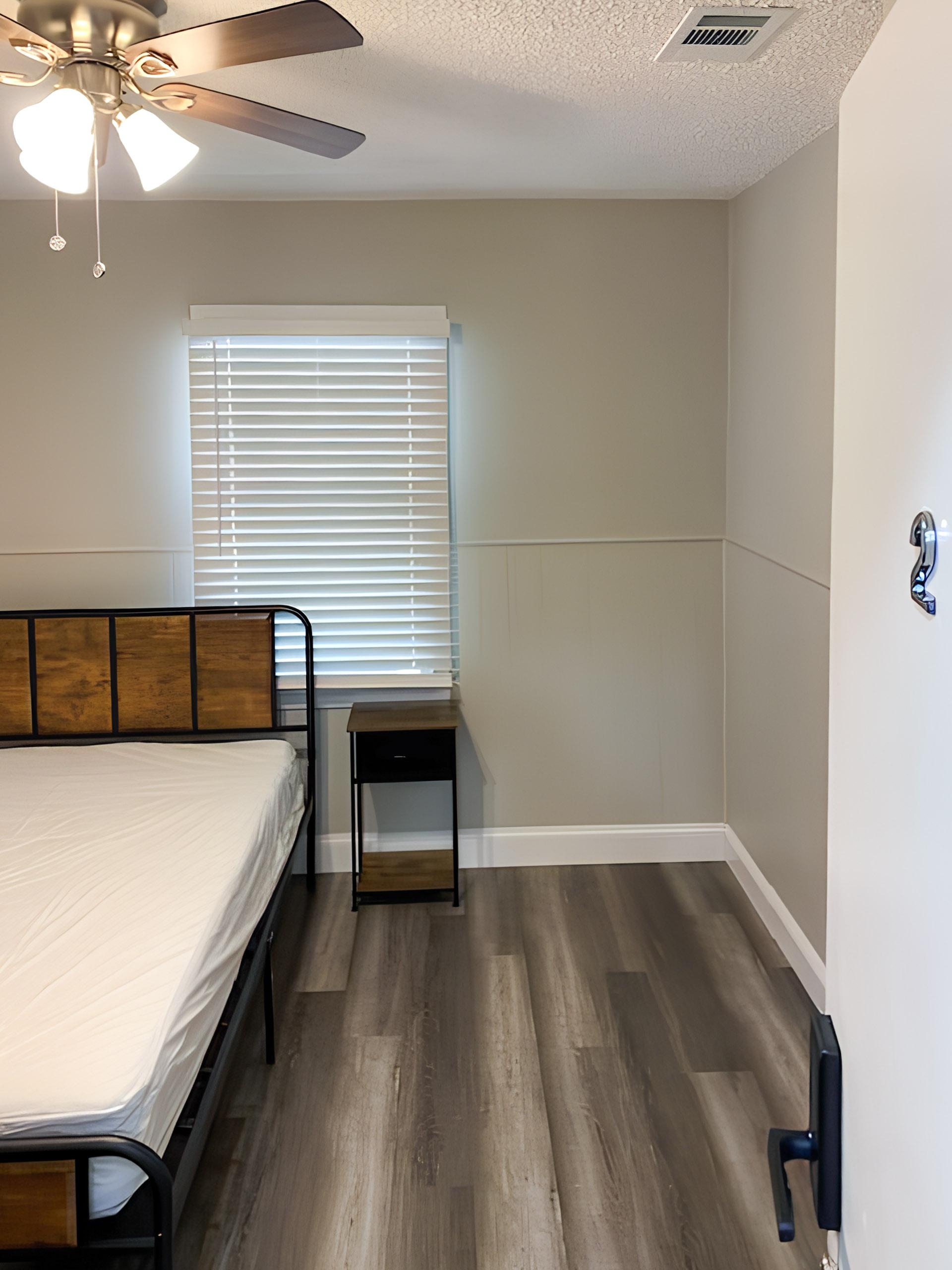 living_room, detected:ceiling fan, window blind