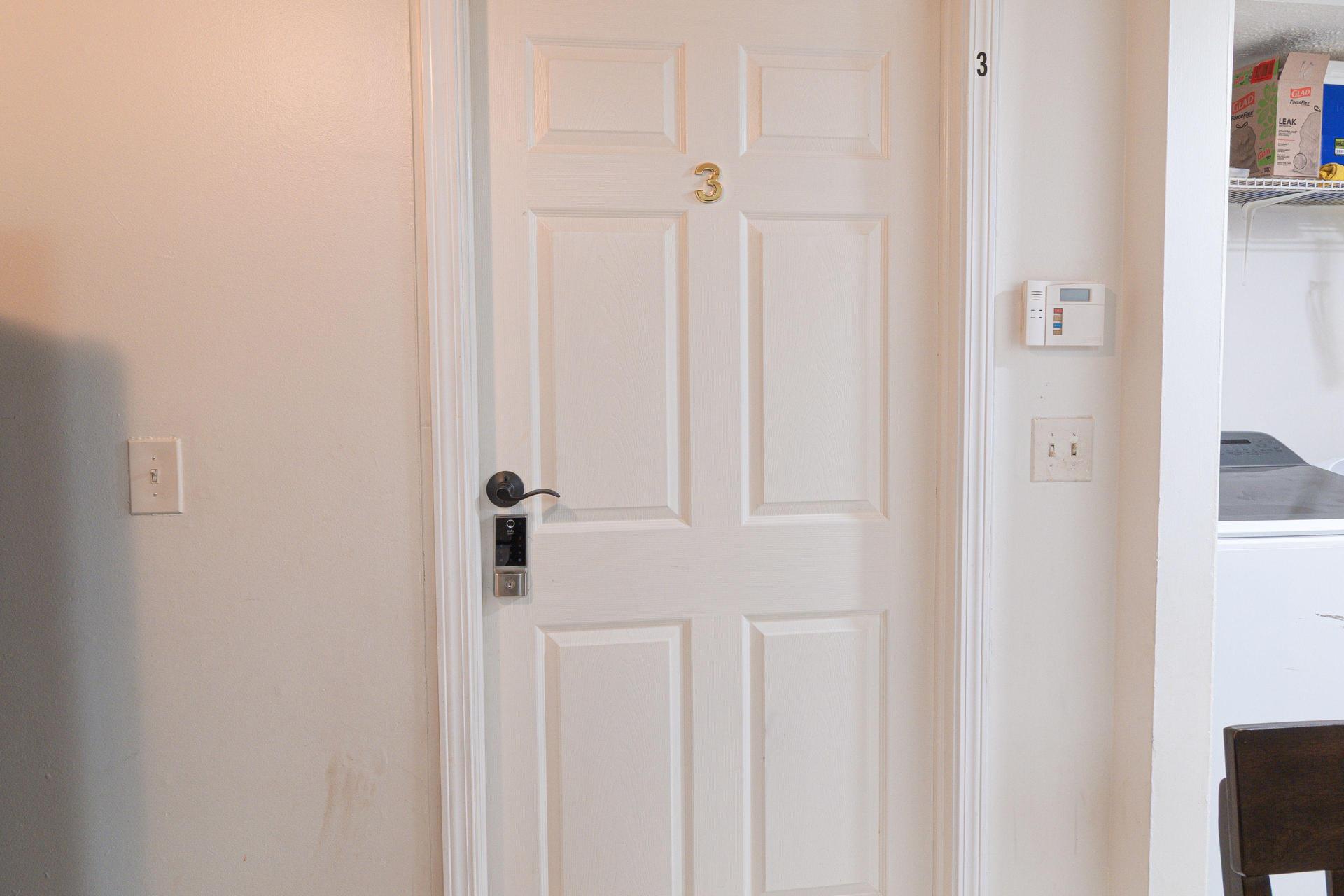 Room Door is off the kitchen and next to the laundry area