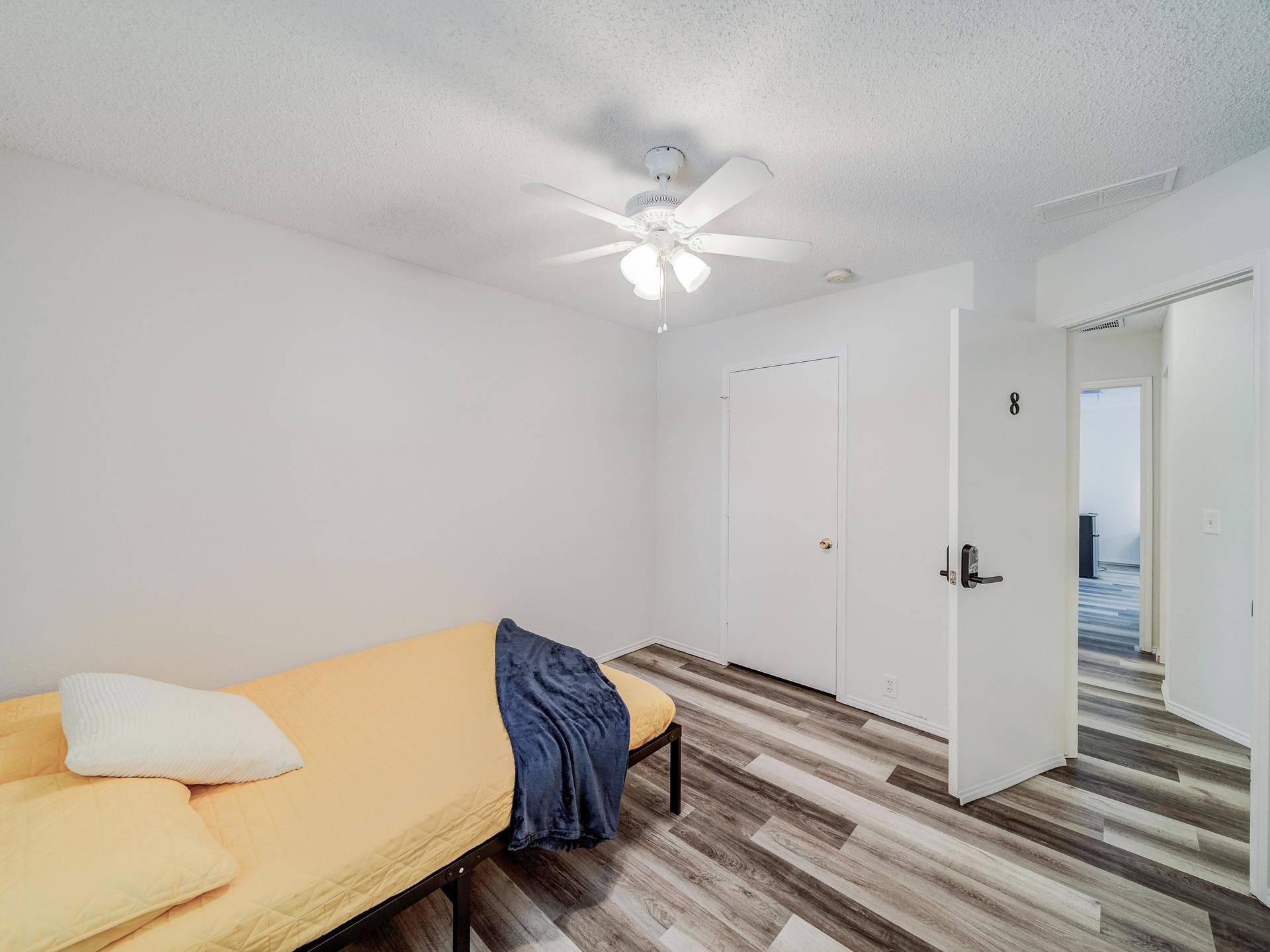 living_room, detected:ceiling fan, window blind