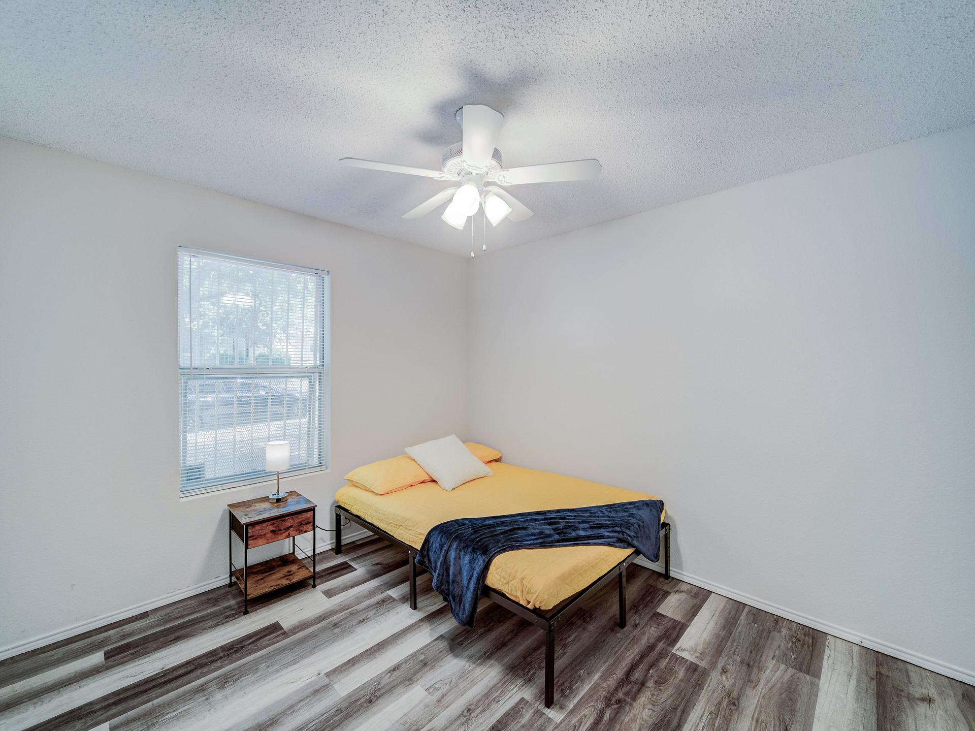living_room, detected:ceiling fan, window blind